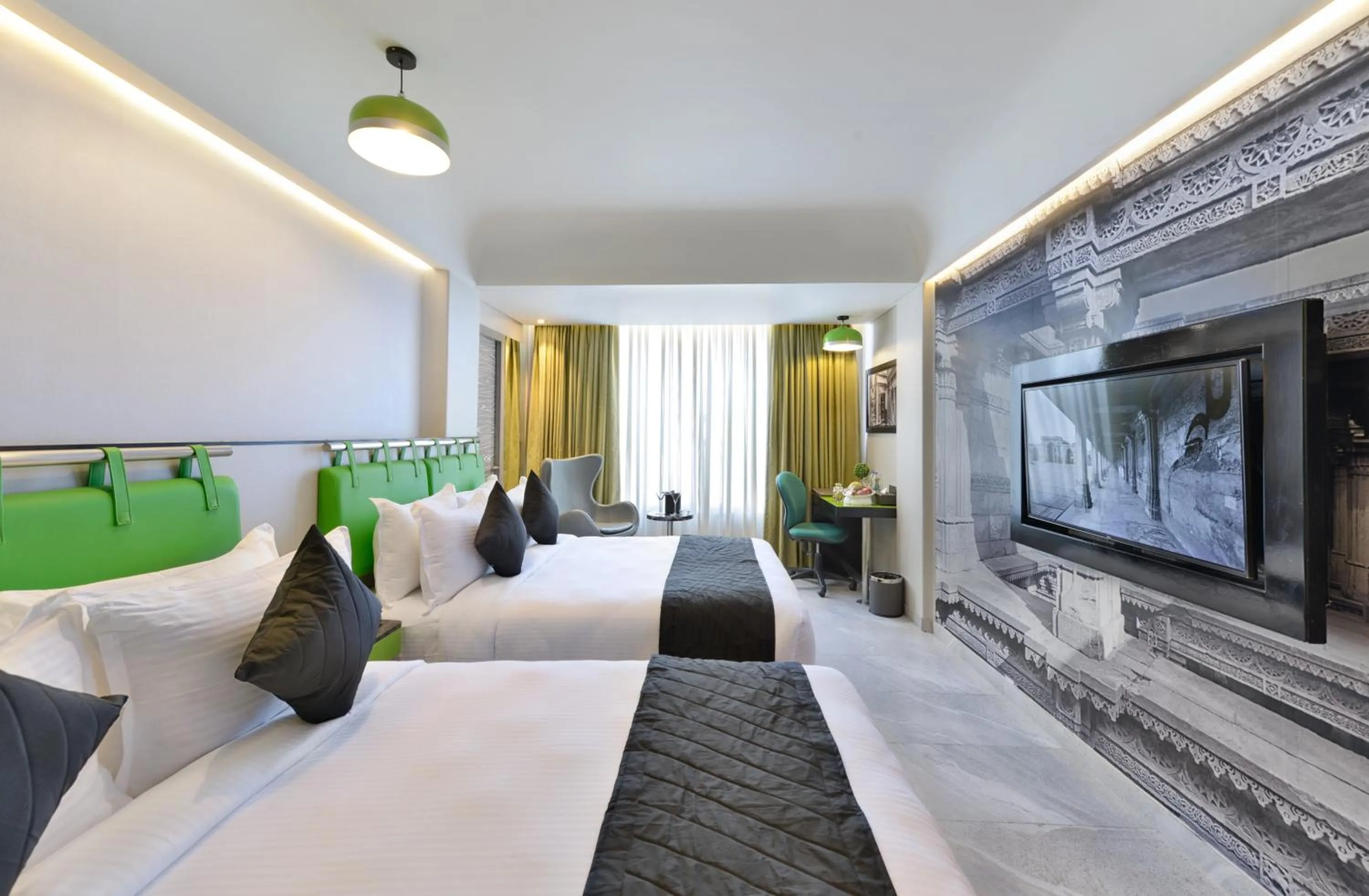 Bedroom, Bed in Regenta Central Antarim Ahmedabad