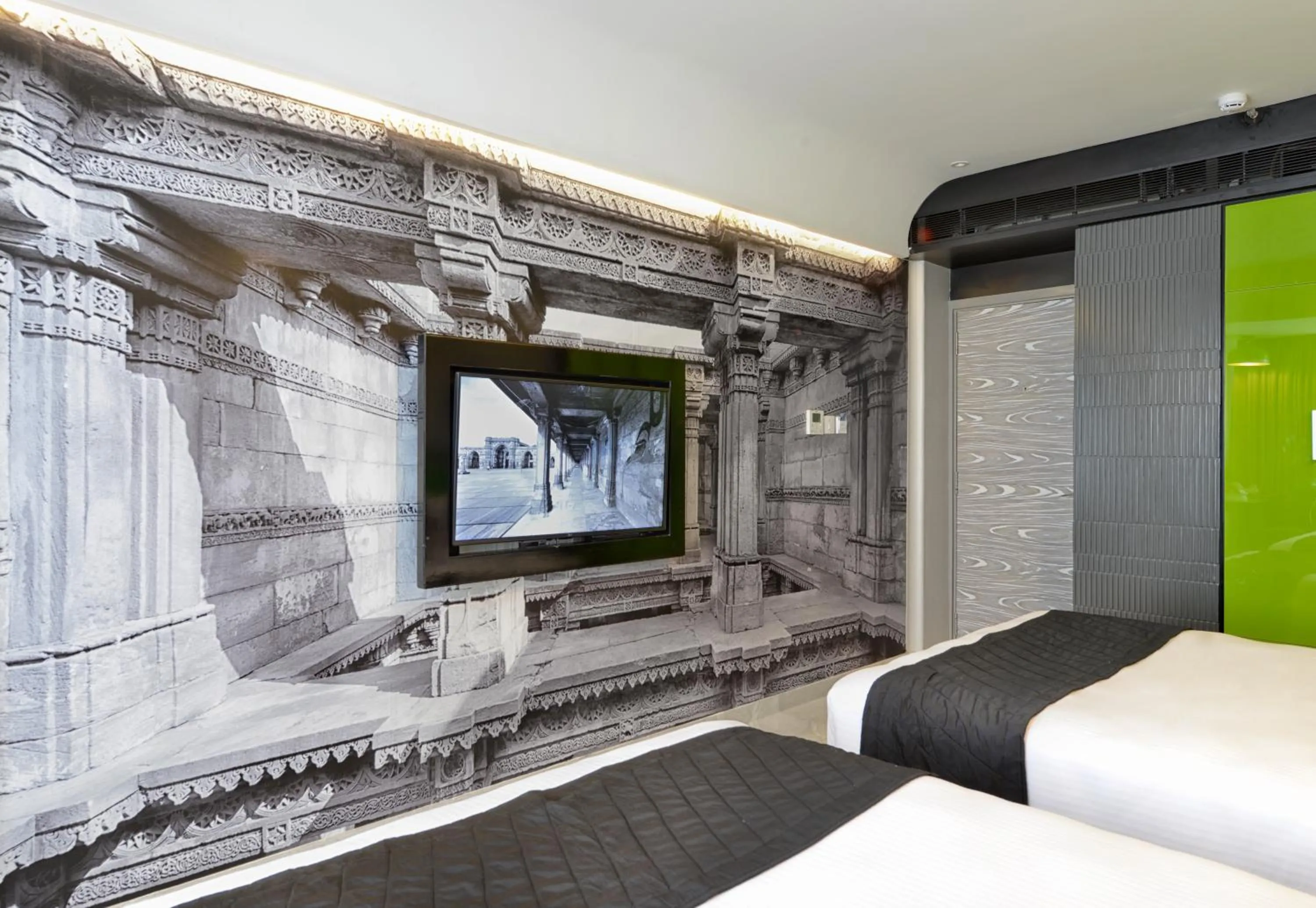 TV and multimedia, Bed in Regenta Central Antarim Ahmedabad