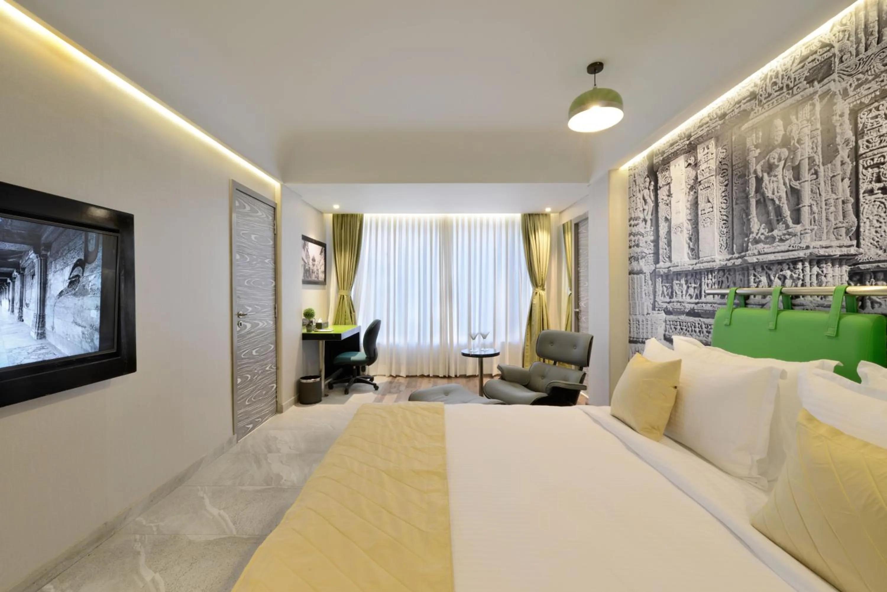 Photo of the whole room, Bed in Regenta Central Antarim Ahmedabad