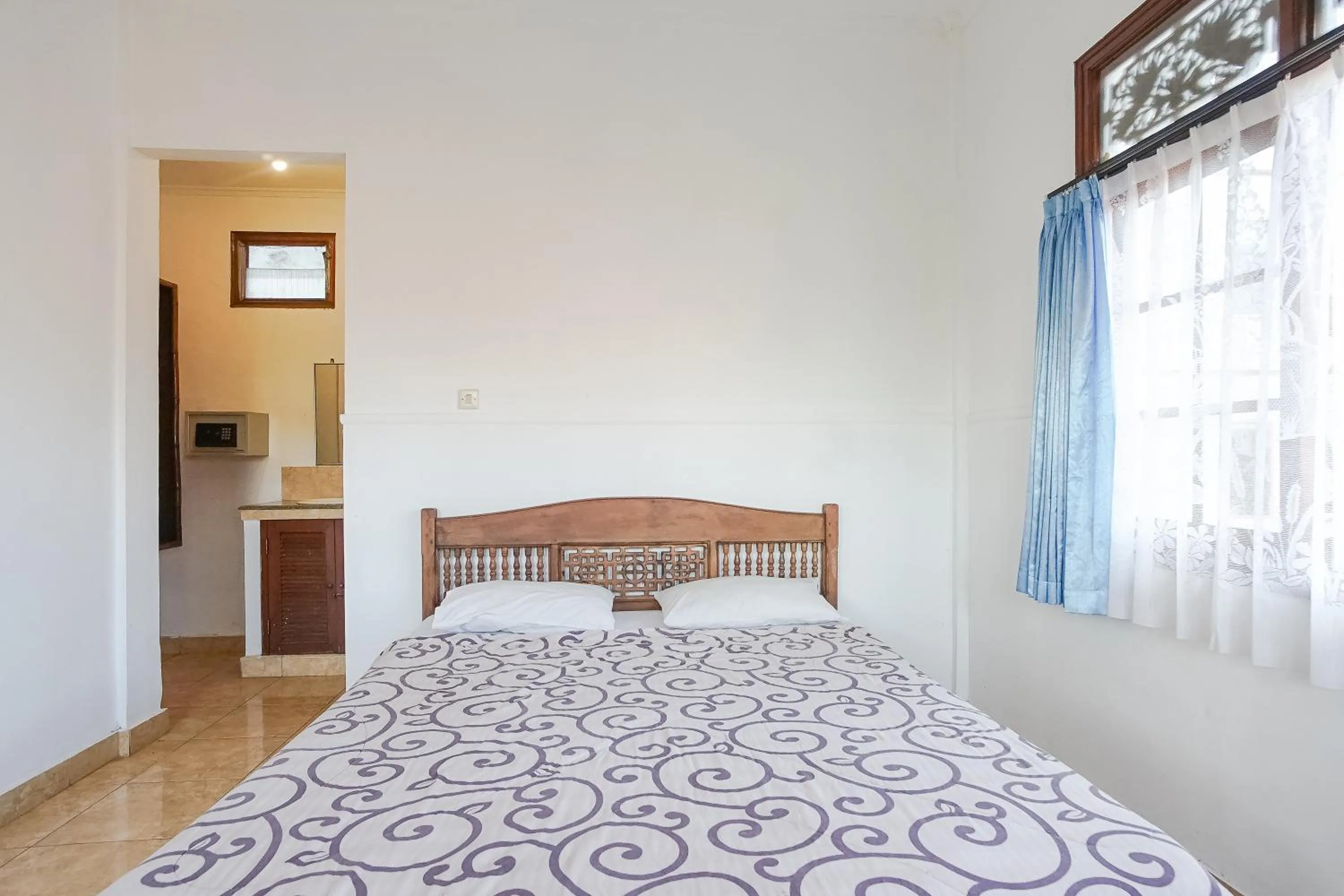 Bed in Indopurejoy House - Komala Indah Cottages