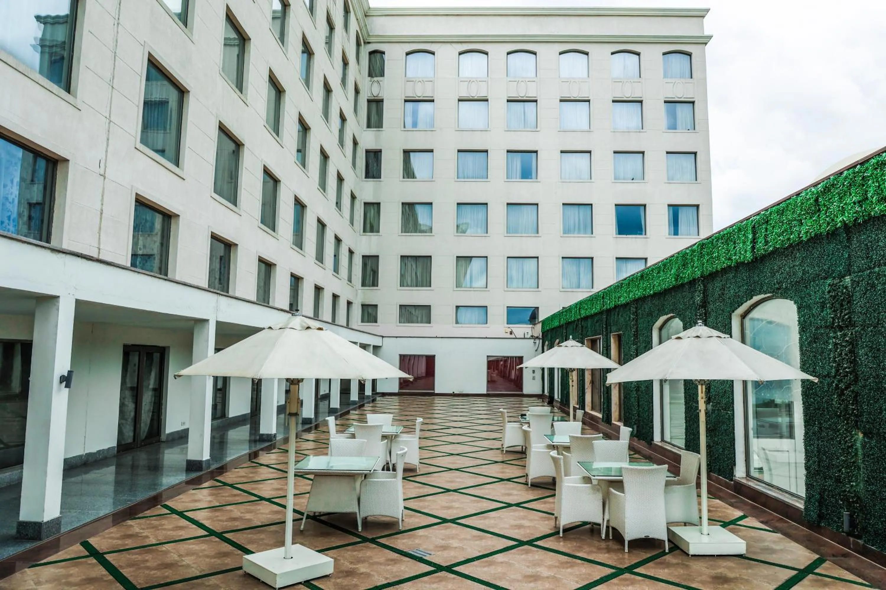 Swimming pool in Ramada by Wyndham Lucknow Hotel and Convention Center