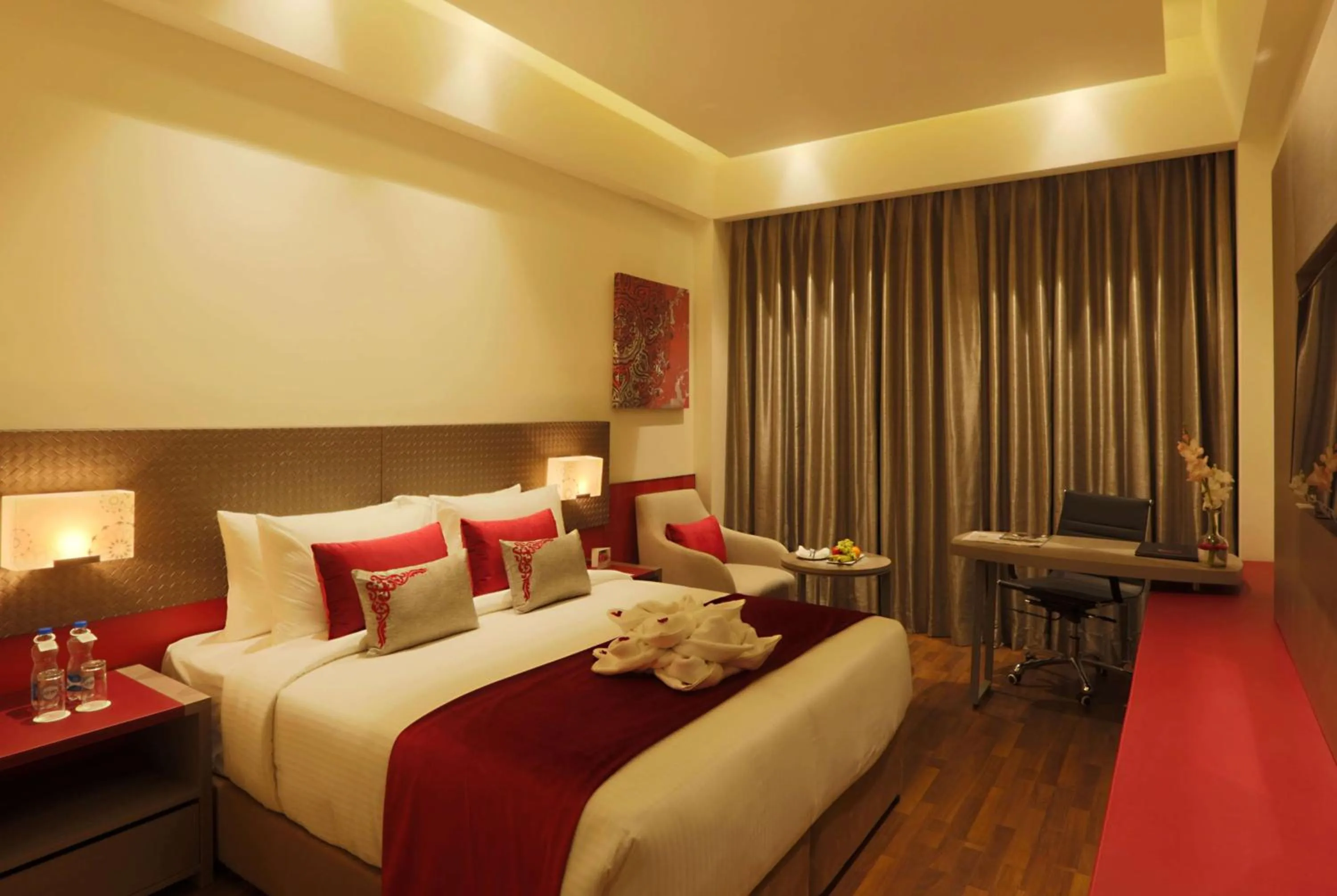 Photo of the whole room, Bed in Ramada by Wyndham Lucknow Hotel and Convention Center
