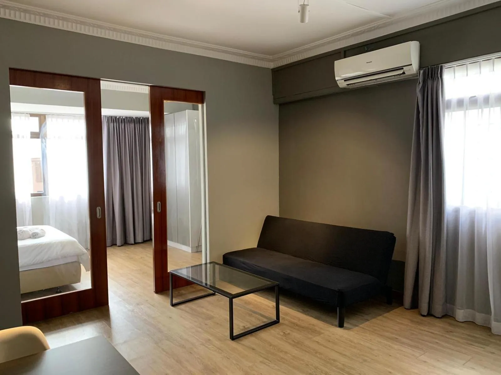 Living room, Bed in Greatwood Residence at Devonshire