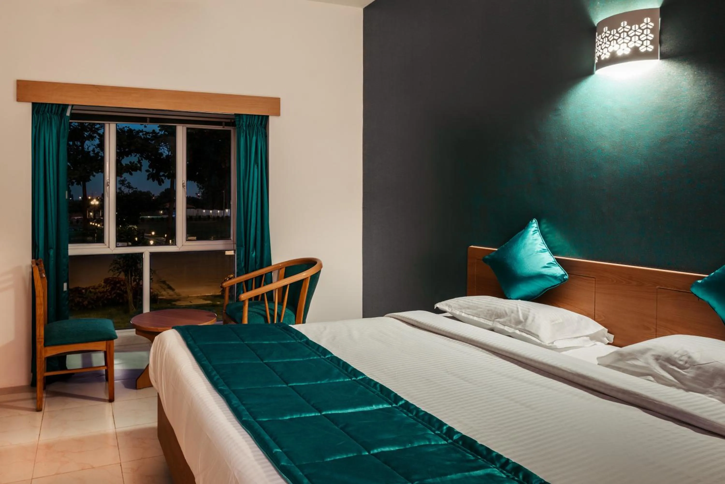 Photo of the whole room, Bed in Fiestaa Resort n Events Venue