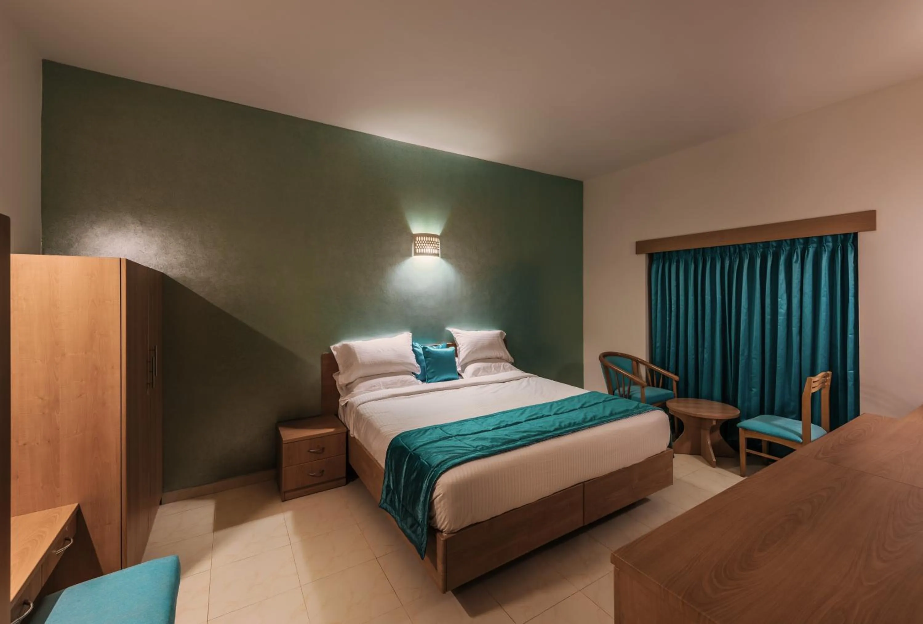 Photo of the whole room, Bed in Fiestaa Resort n Events Venue