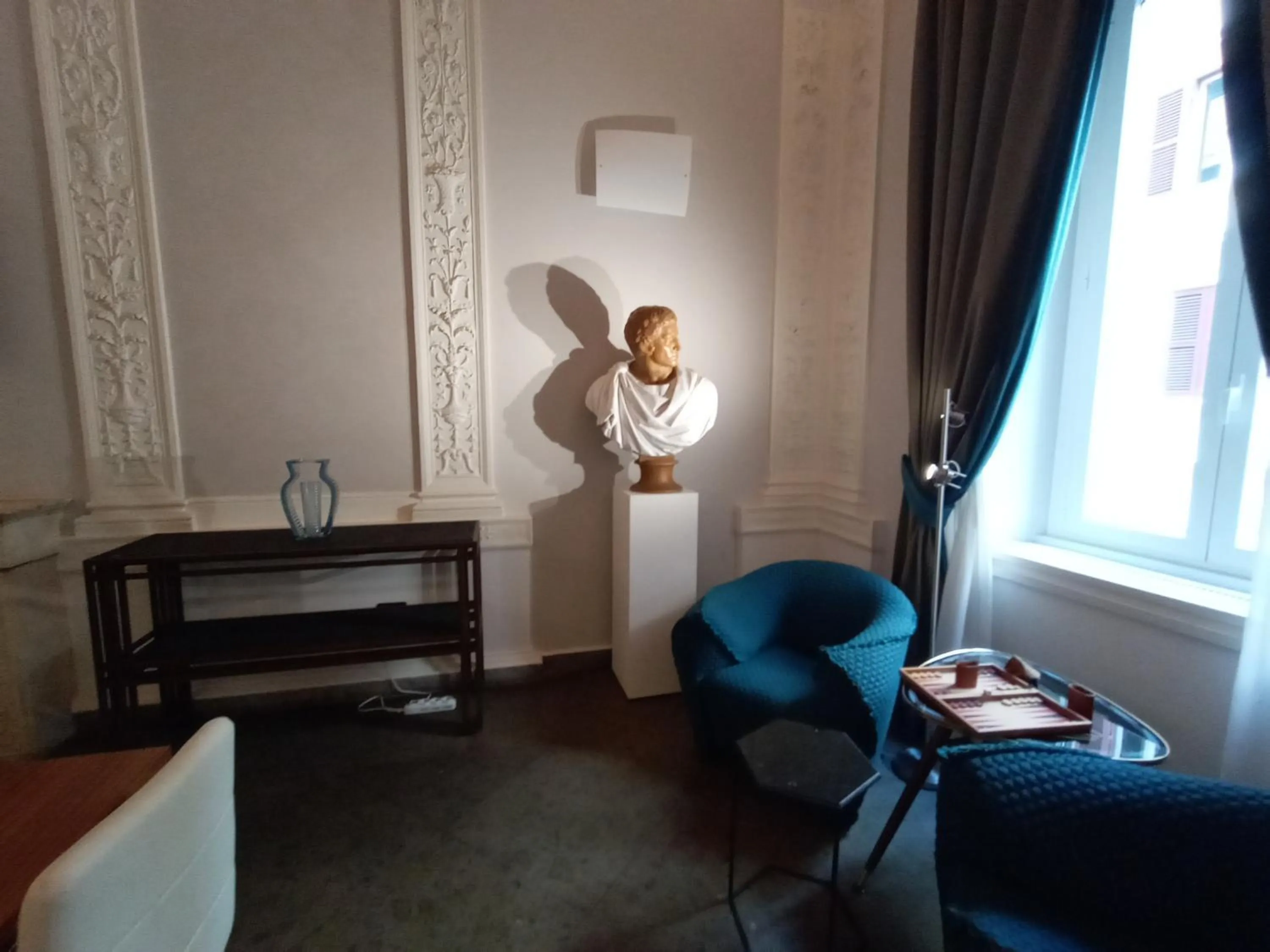 Communal lounge/ TV room in L'obelisque maison de luxe