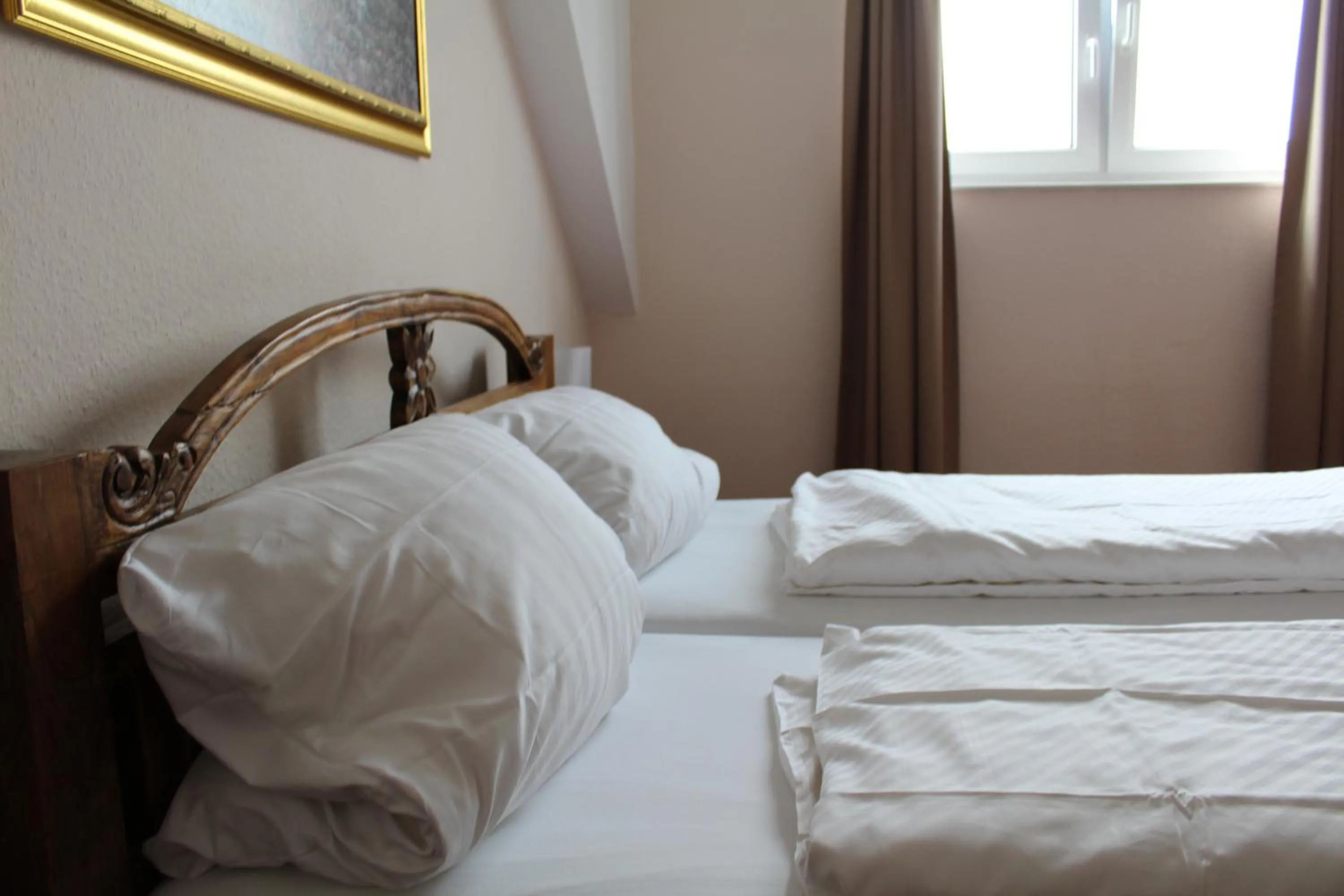 Bed in Hotel Gardenia