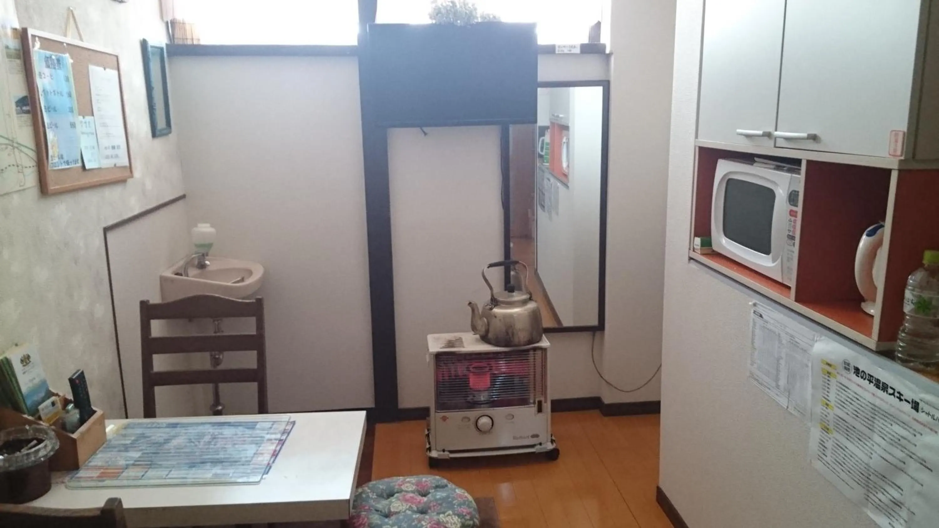 Communal lounge/ TV room in Lodge Amenouo