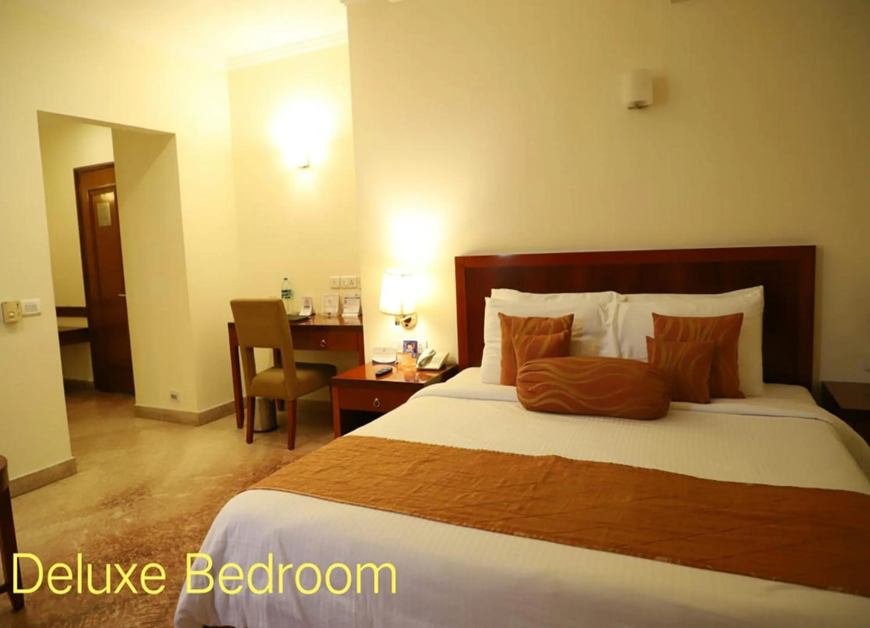 Photo of the whole room, Bed in Royal Sarovar Portico Siliguri