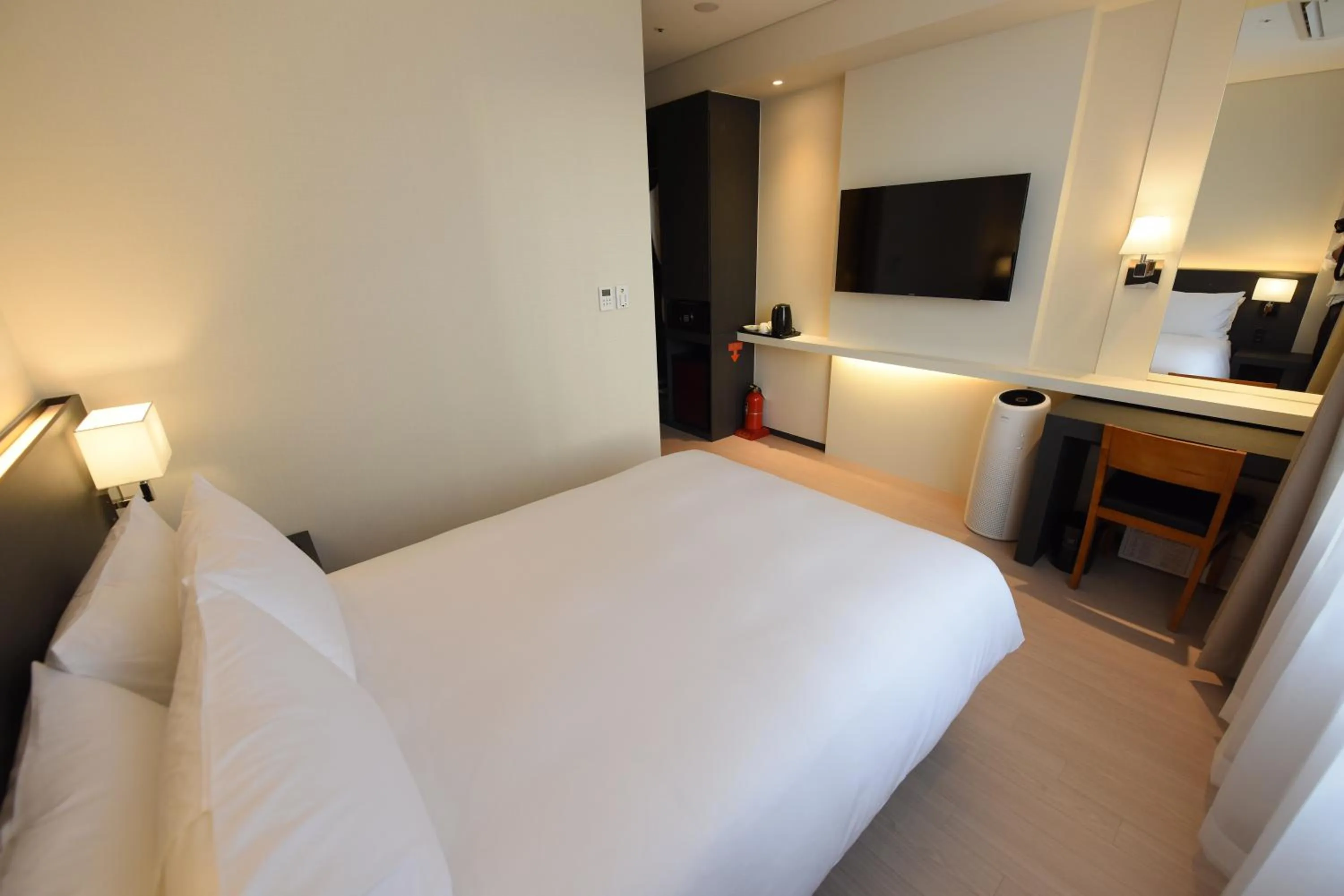 Bed in Geoje Artnouveau Suite Hotel