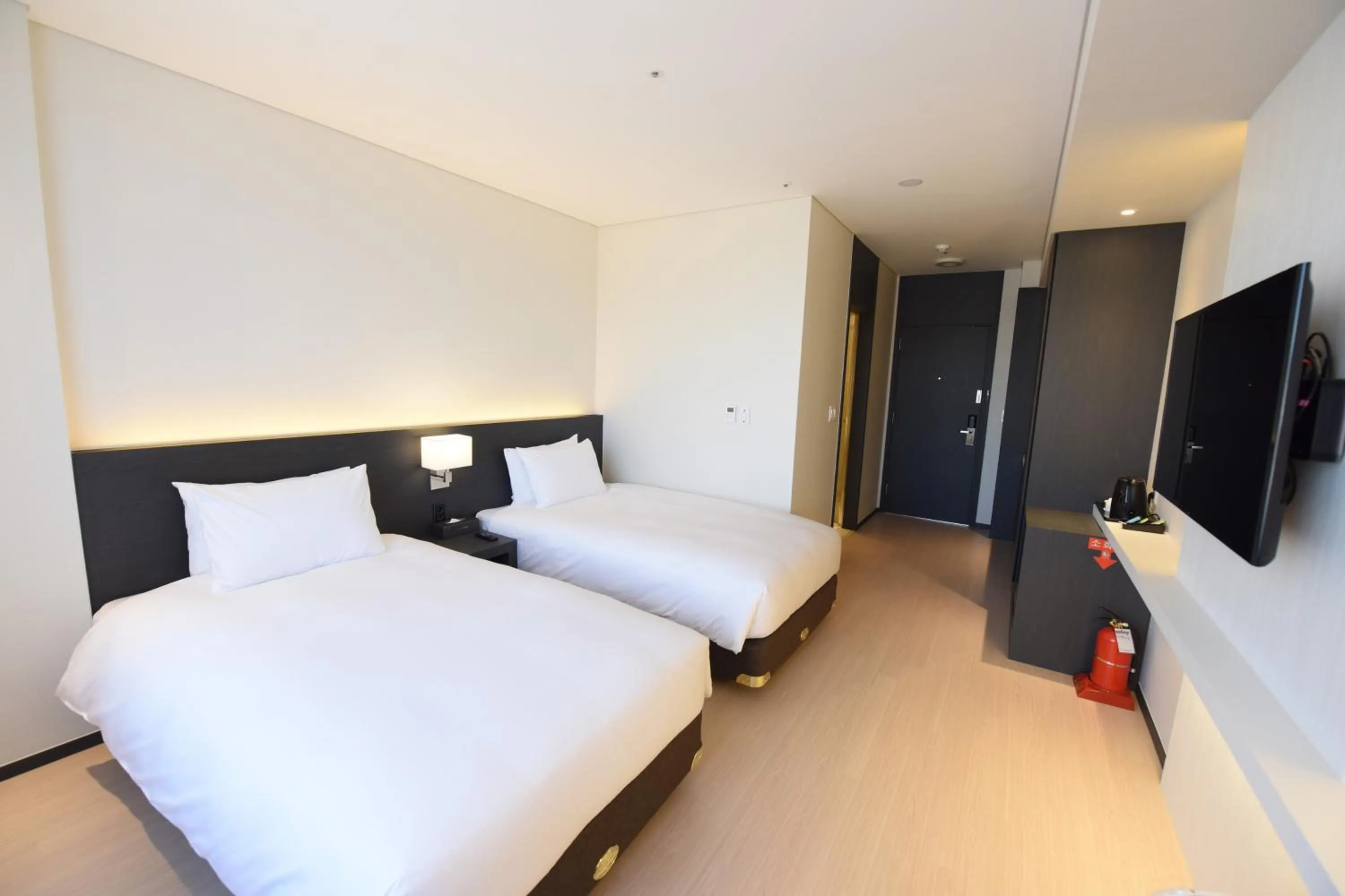 Bed in Geoje Artnouveau Suite Hotel