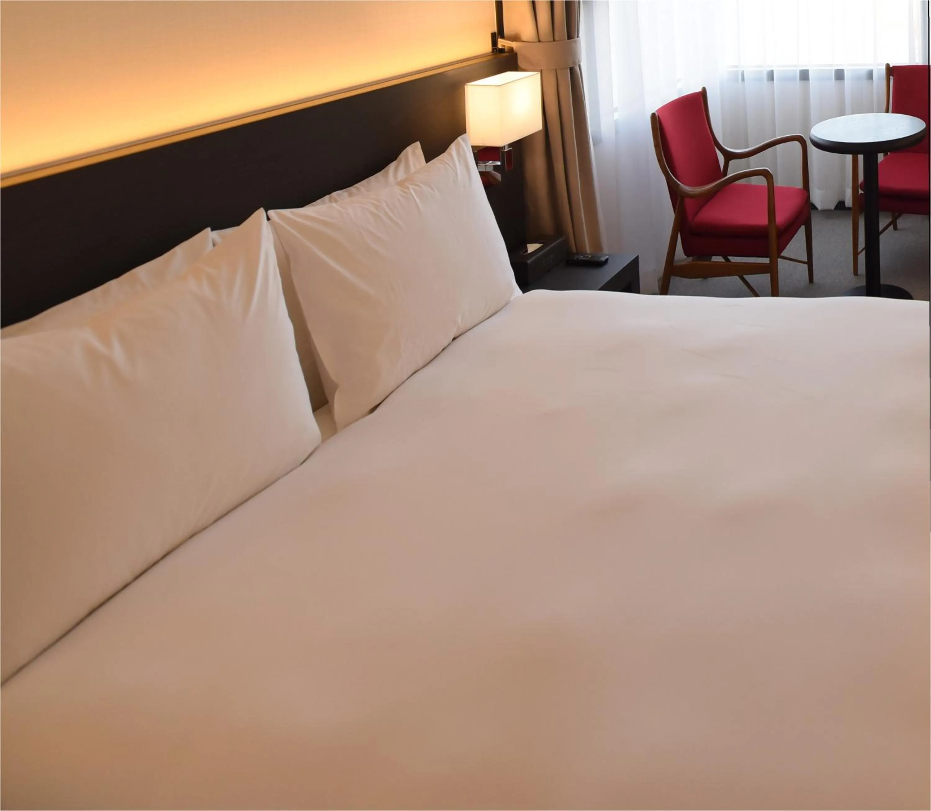 Bed in Geoje Artnouveau Suite Hotel