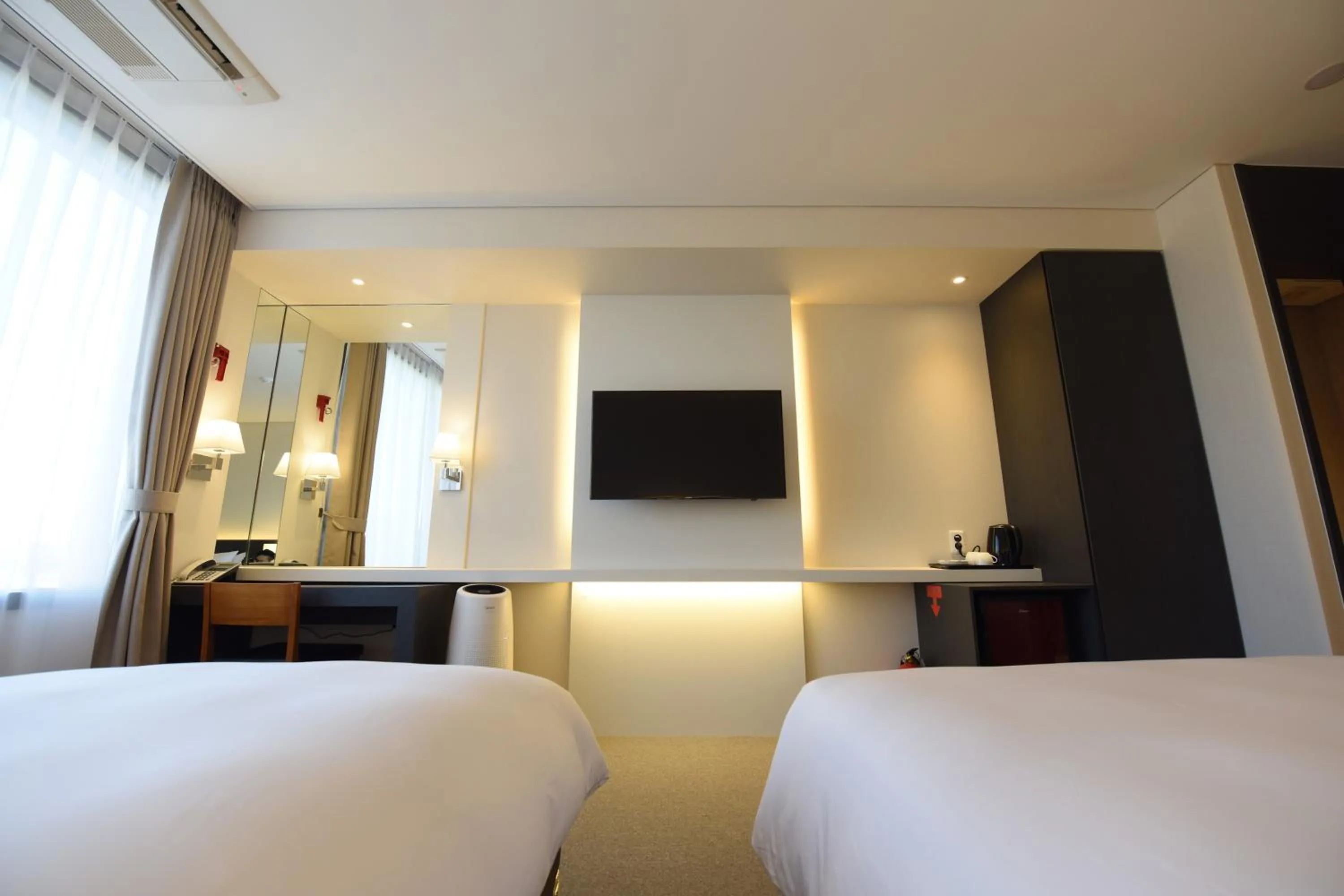 Bed in Geoje Artnouveau Suite Hotel