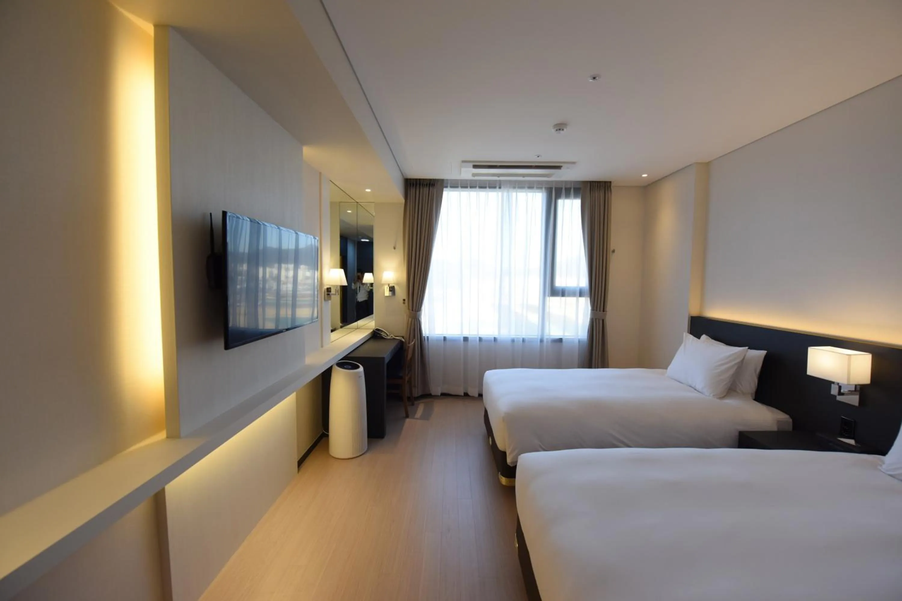 Bed in Geoje Artnouveau Suite Hotel