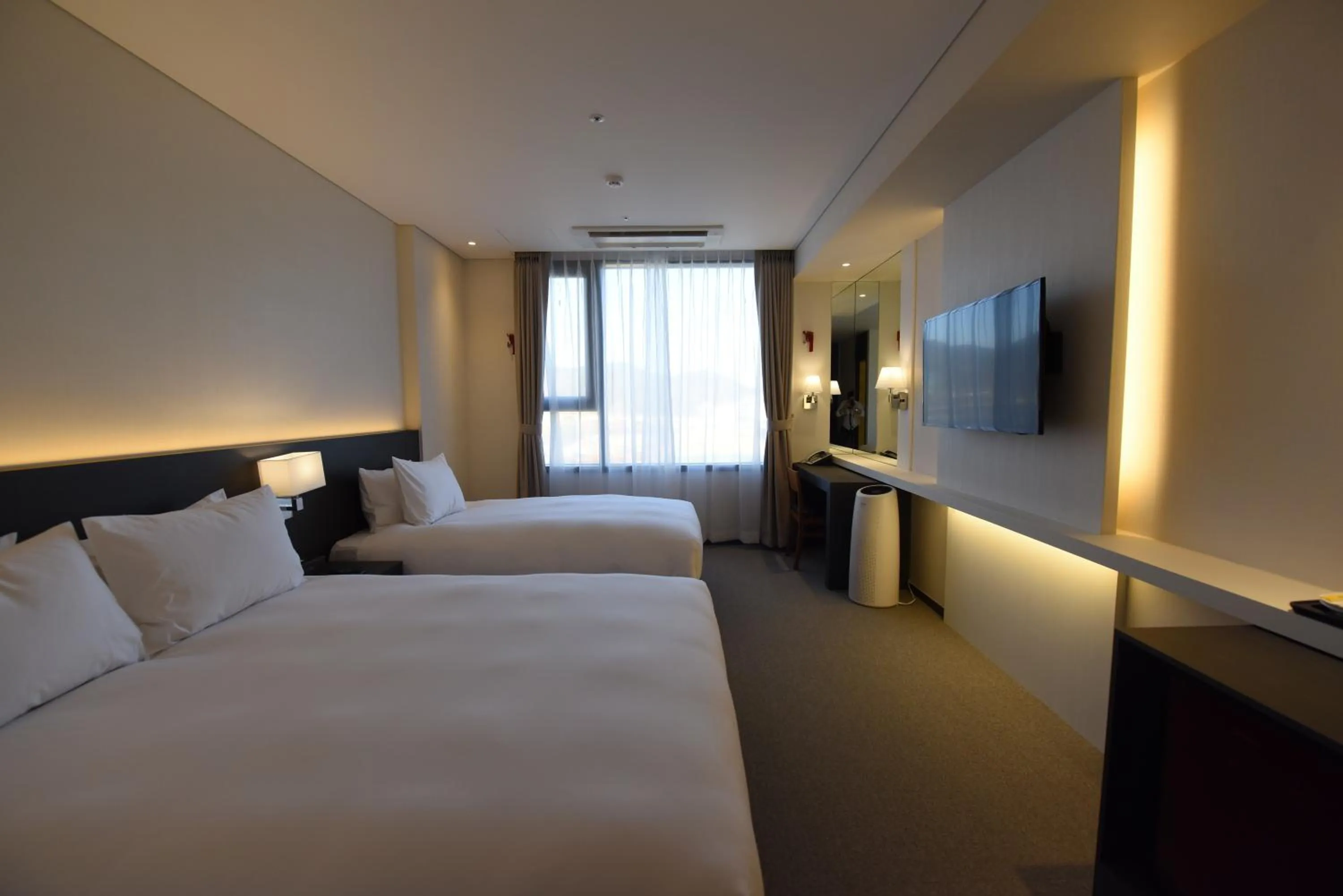 Bed in Geoje Artnouveau Suite Hotel