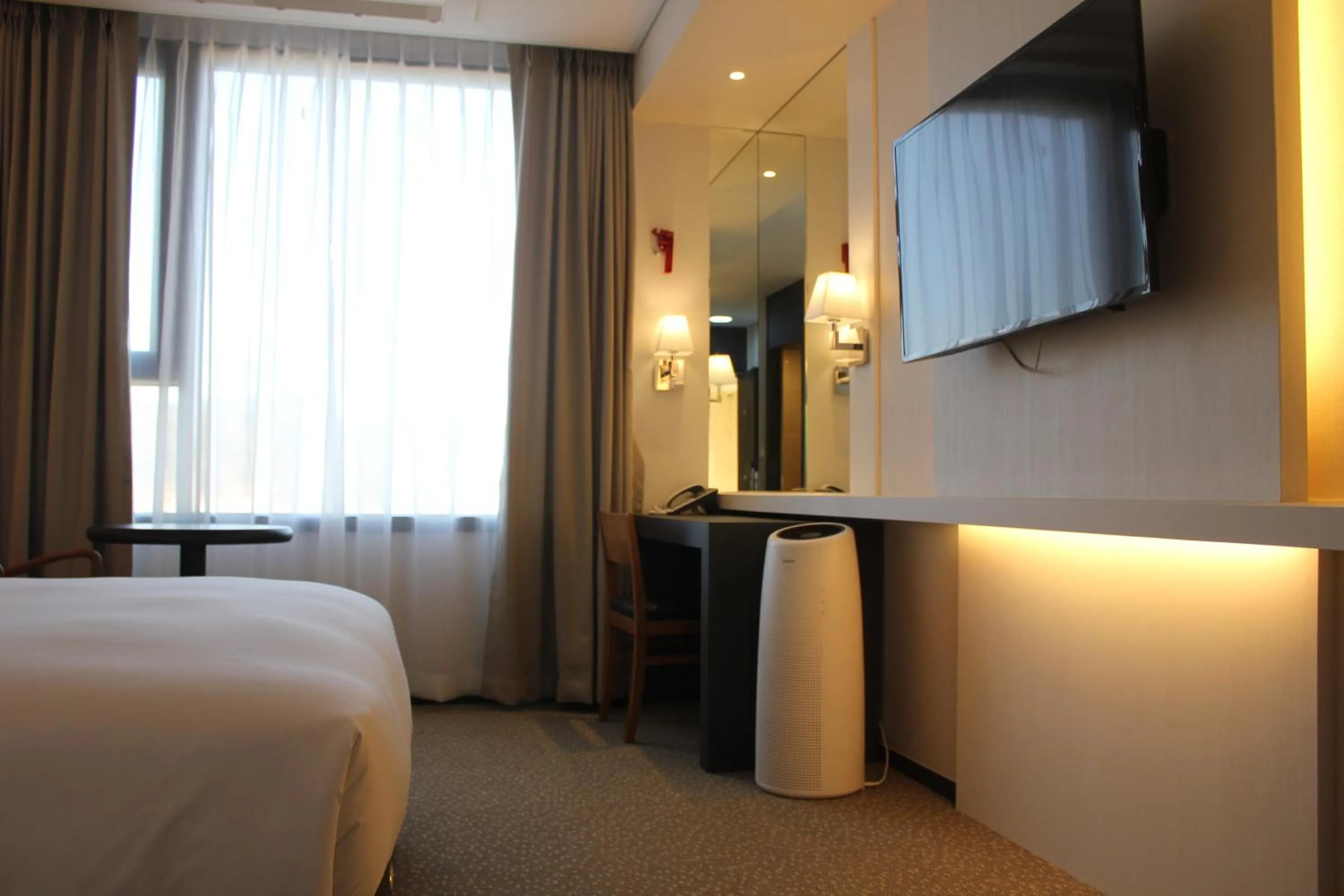 Bed in Geoje Artnouveau Suite Hotel