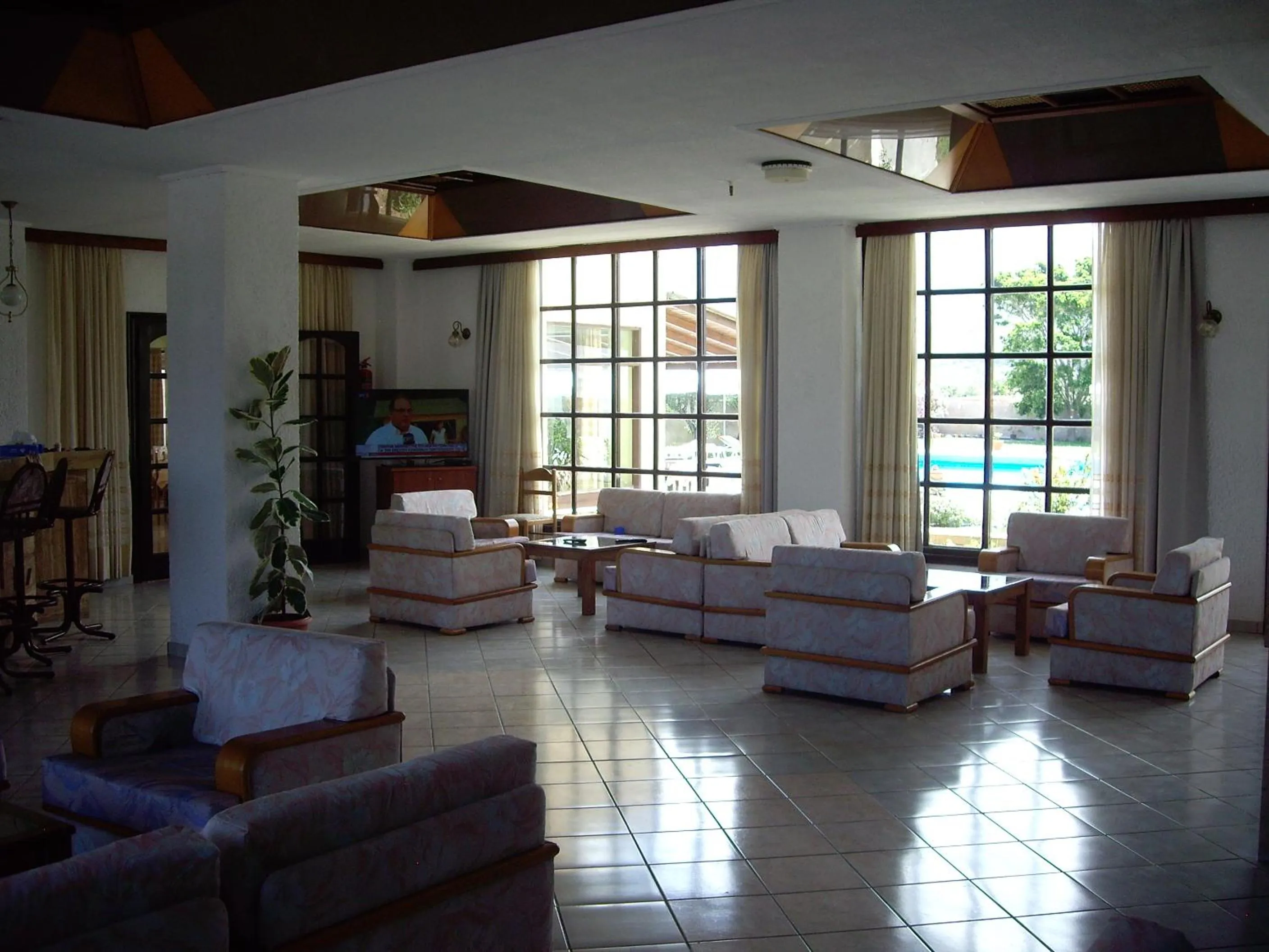Communal lounge/ TV room in Hotel Hermes