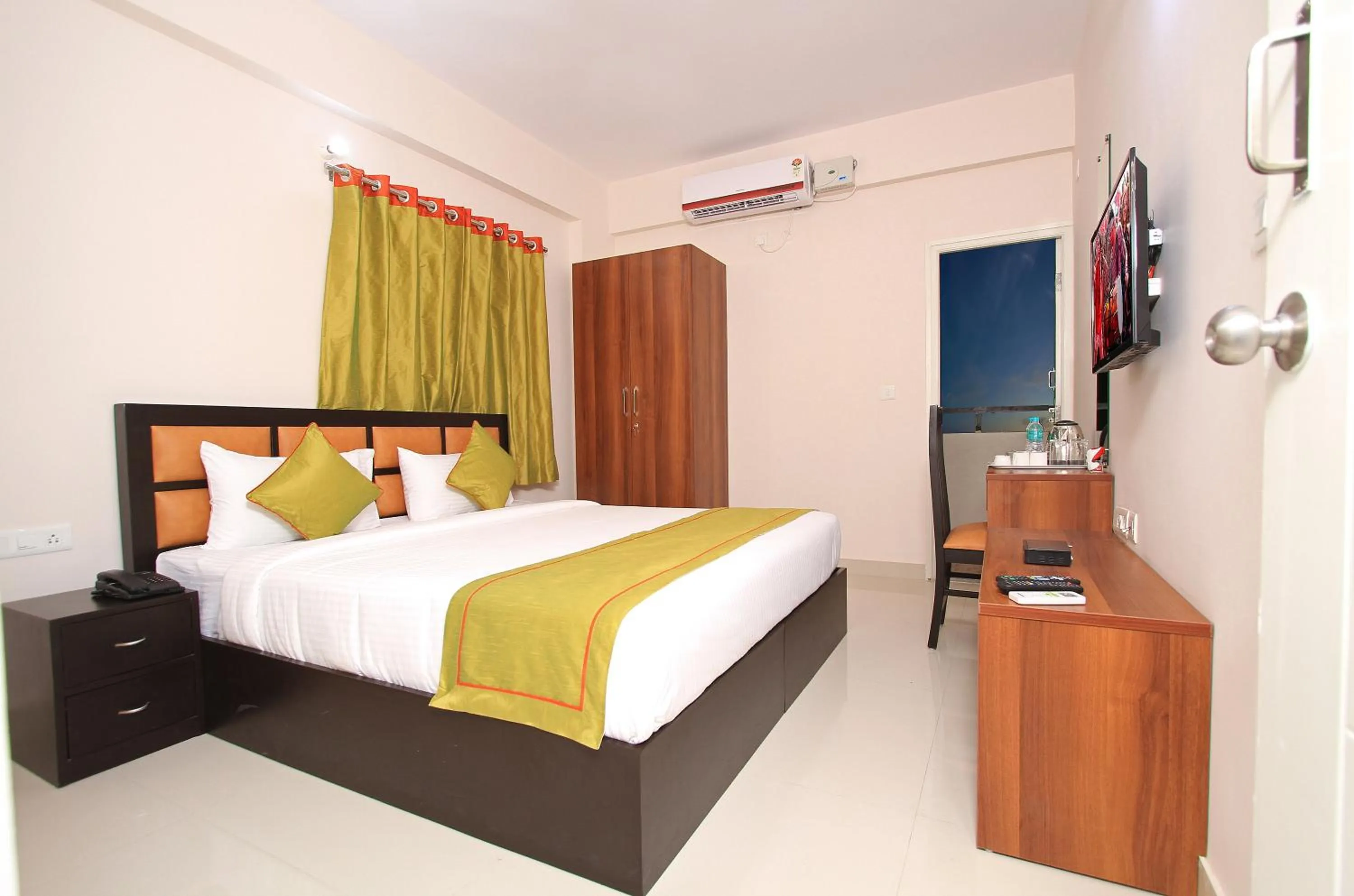 Bed in Arra Grande Suites - Nearest Airport Hotels Bangalore