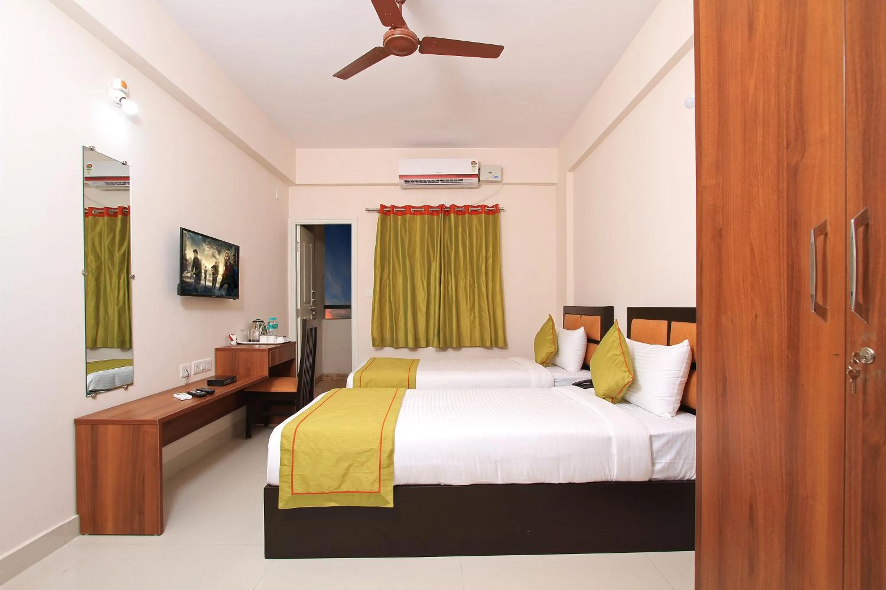 Bed in Arra Grande Suites - Nearest Airport Hotels Bangalore