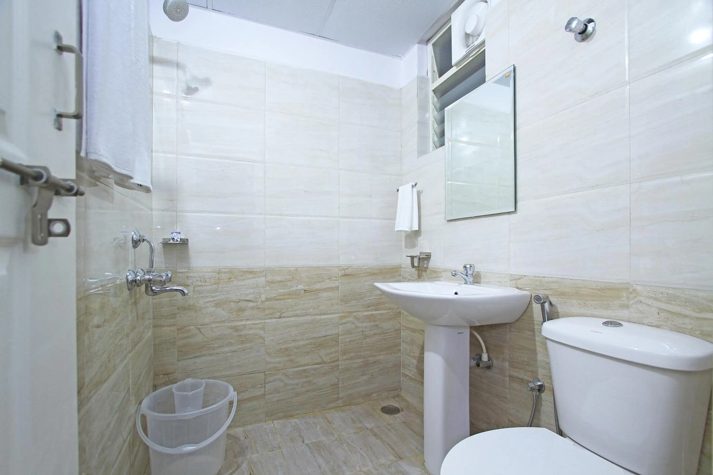 Bathroom in Arra Grande Suites - Nearest Airport Hotels Bangalore