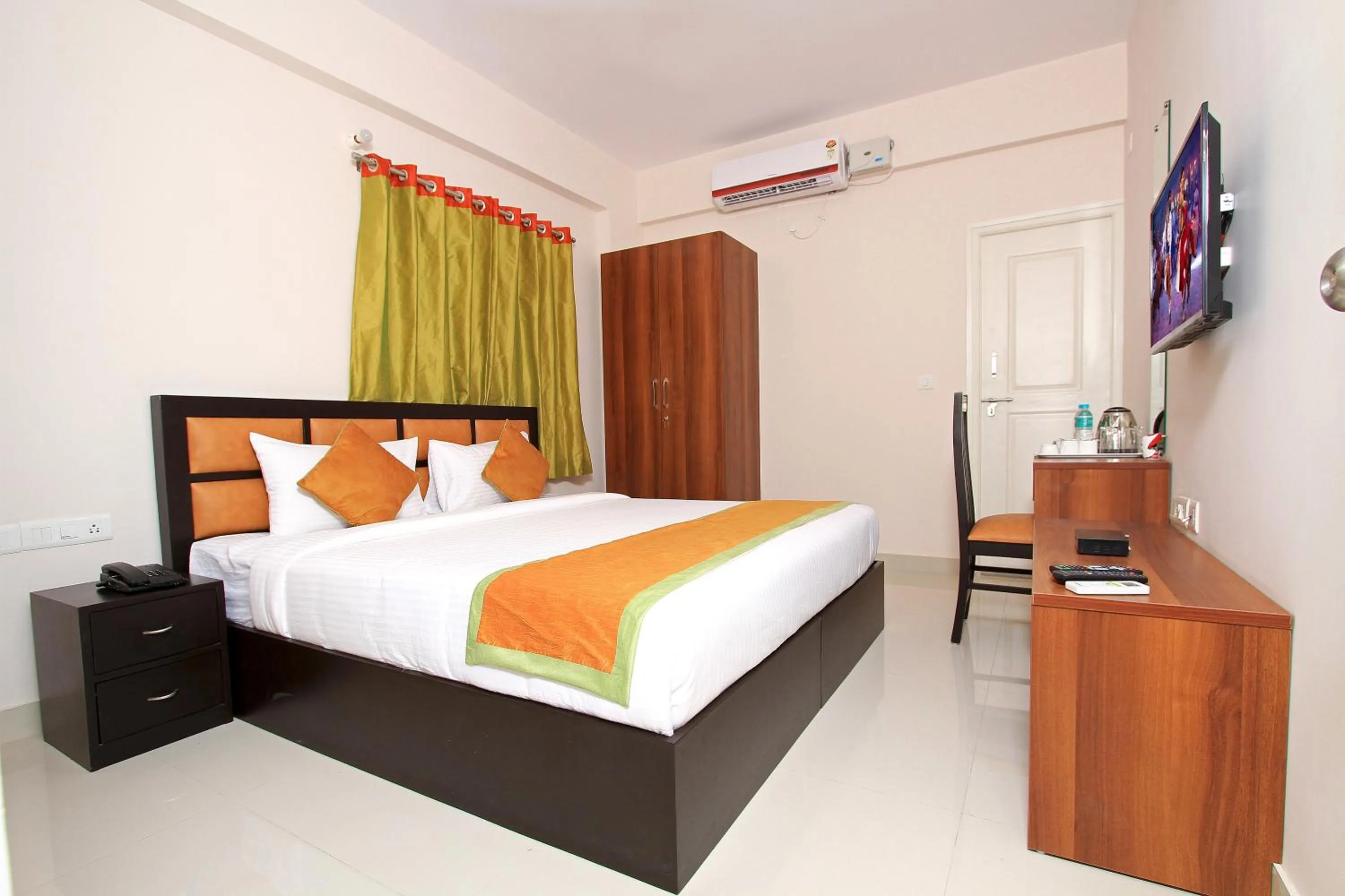 Bed in Arra Grande Suites - Nearest Airport Hotels Bangalore