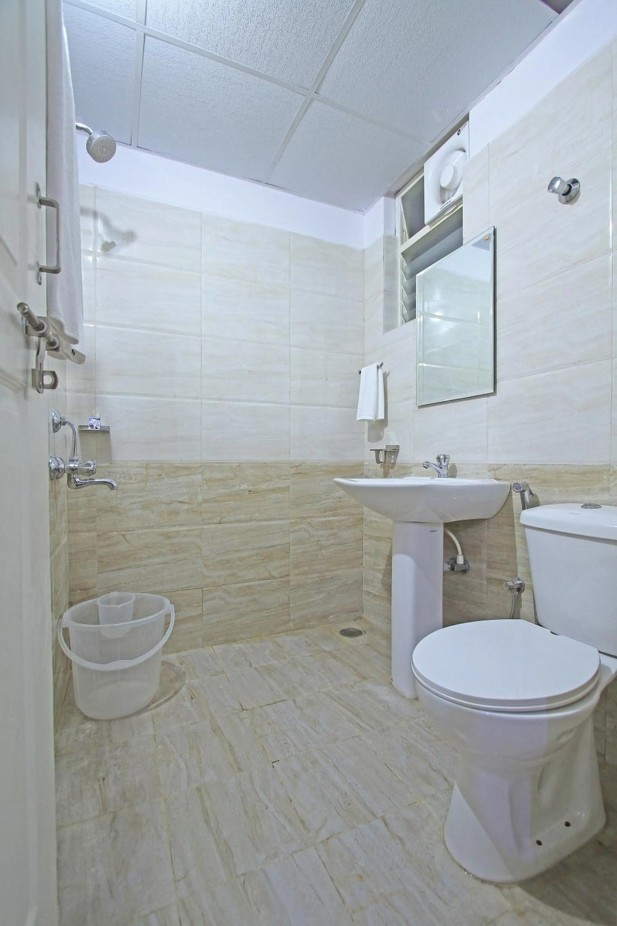 Bathroom in Arra Grande Suites - Nearest Airport Hotels Bangalore