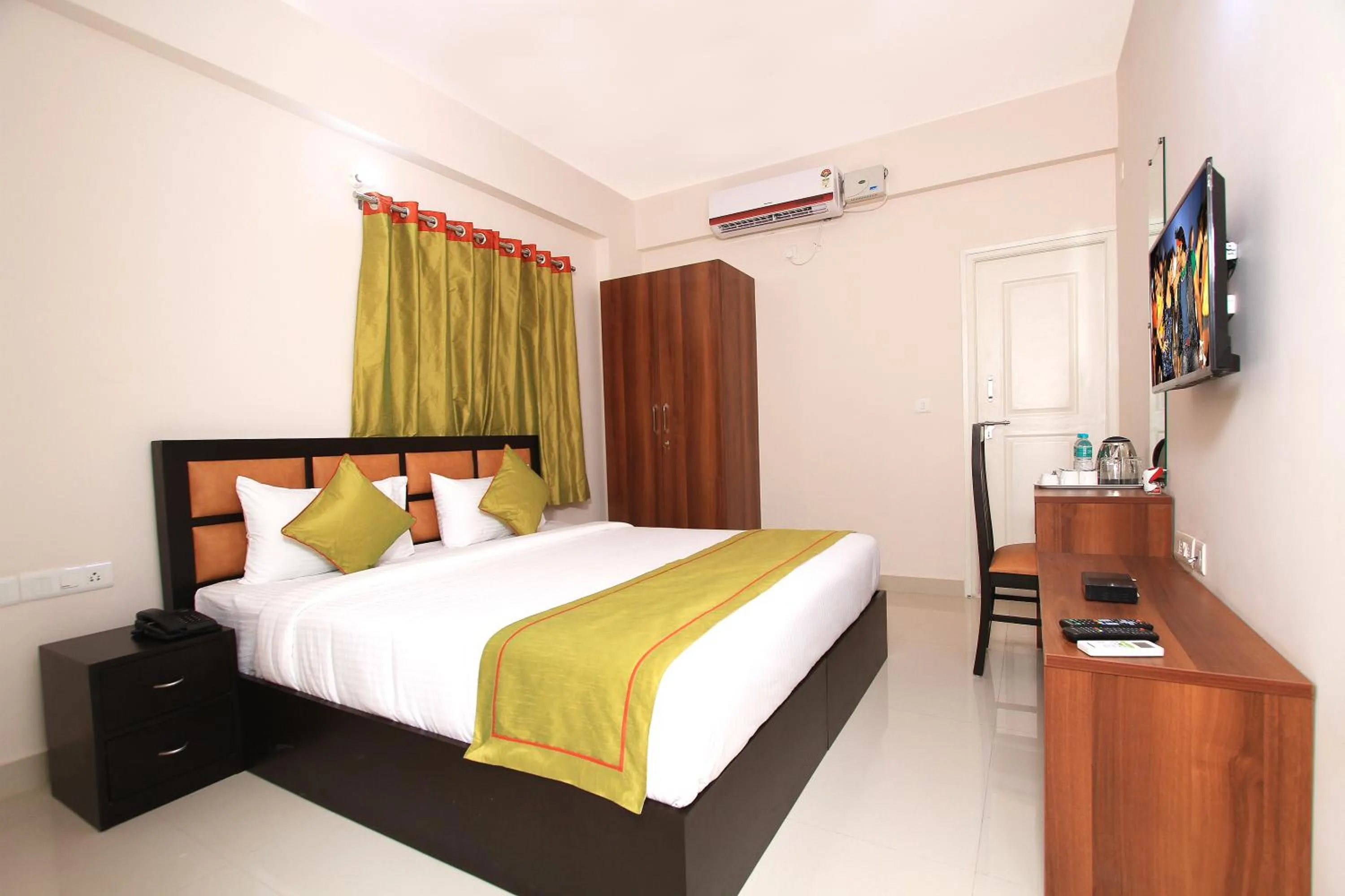 Bed in Arra Grande Suites - Nearest Airport Hotels Bangalore