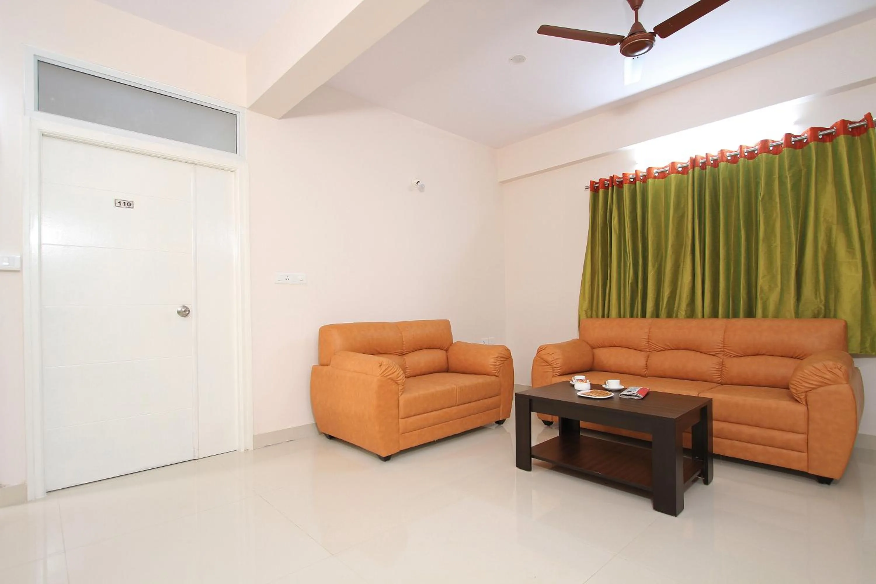 Living room in Arra Grande Suites - Nearest Airport Hotels Bangalore