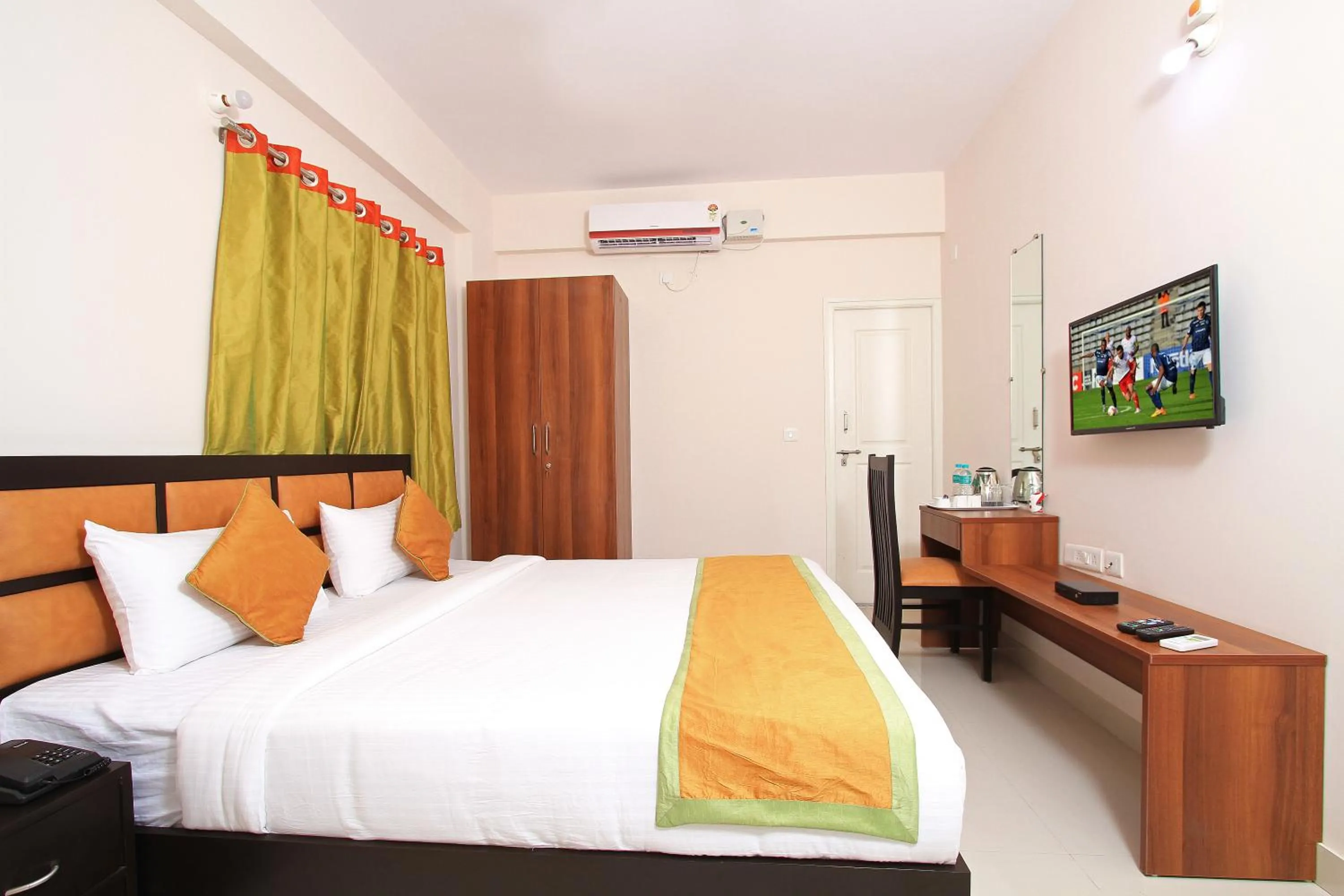 Bed in Arra Grande Suites - Nearest Airport Hotels Bangalore
