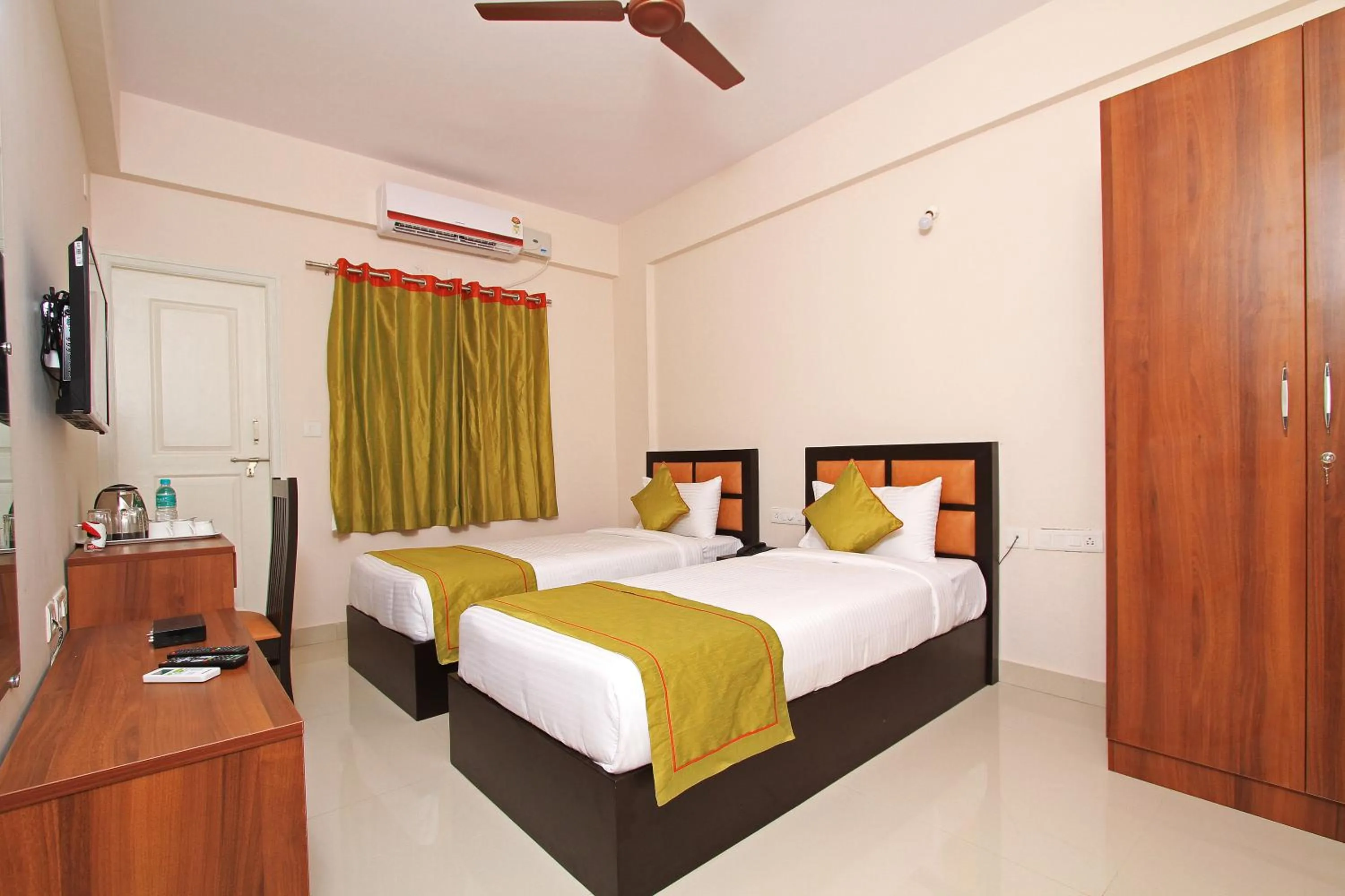 Bed in Arra Grande Suites - Nearest Airport Hotels Bangalore
