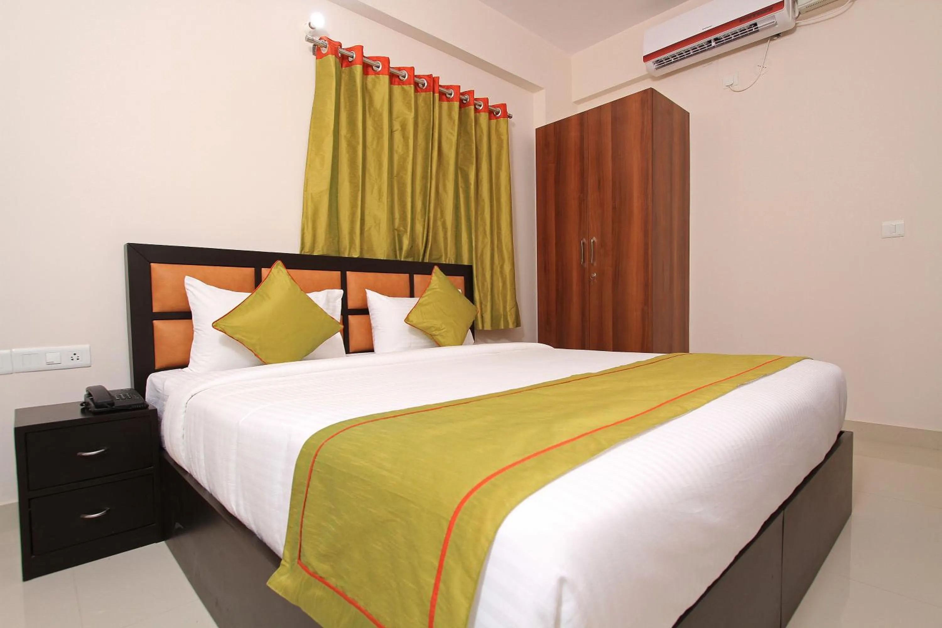 Bed in Arra Grande Suites - Nearest Airport Hotels Bangalore