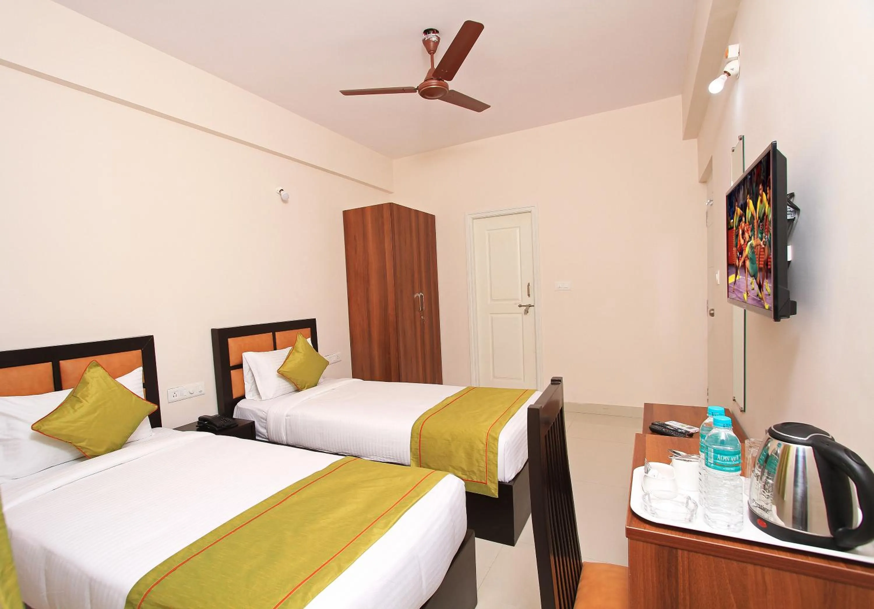 Bed in Arra Grande Suites - Nearest Airport Hotels Bangalore