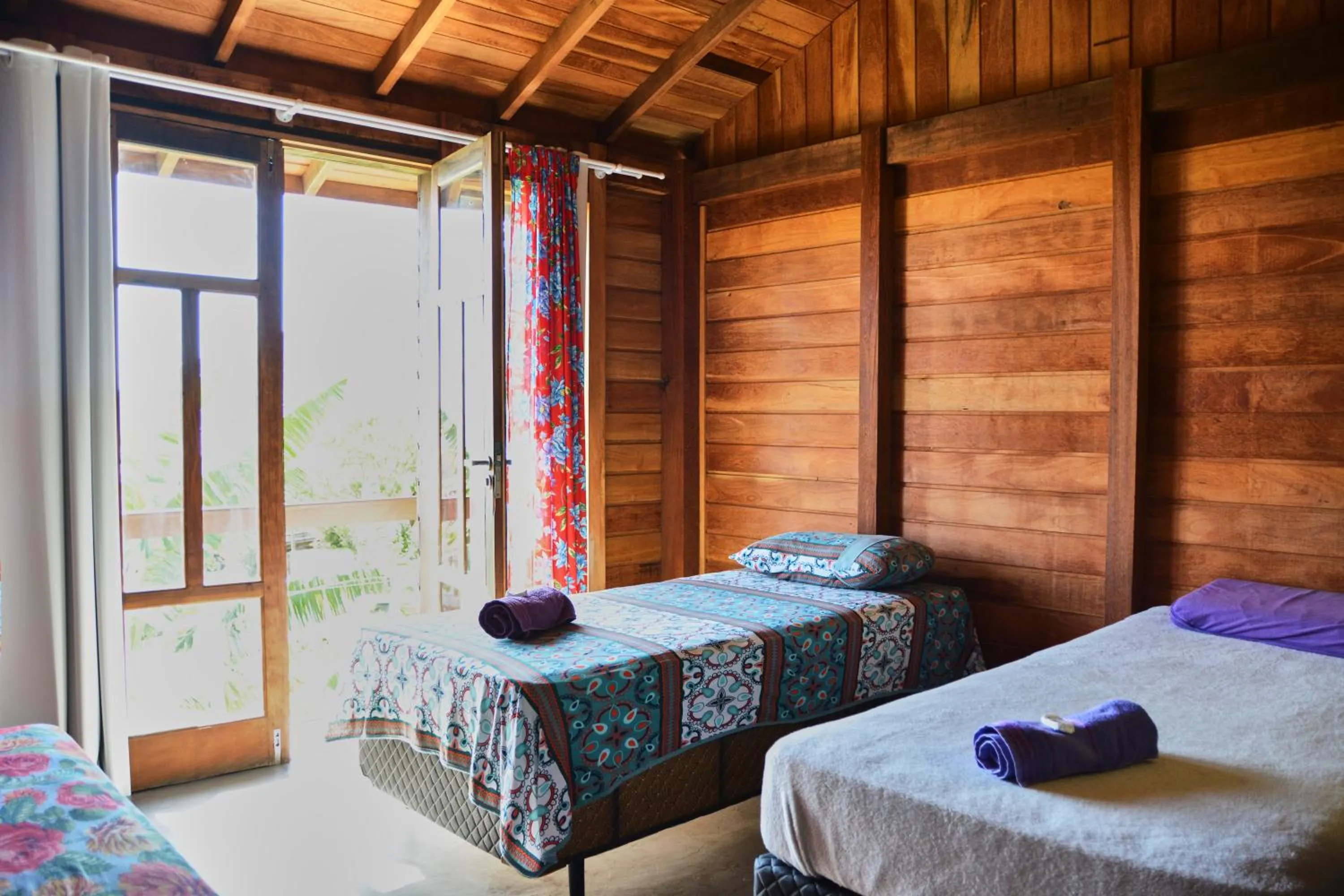 Bed in Pousada Alma da Gamboa