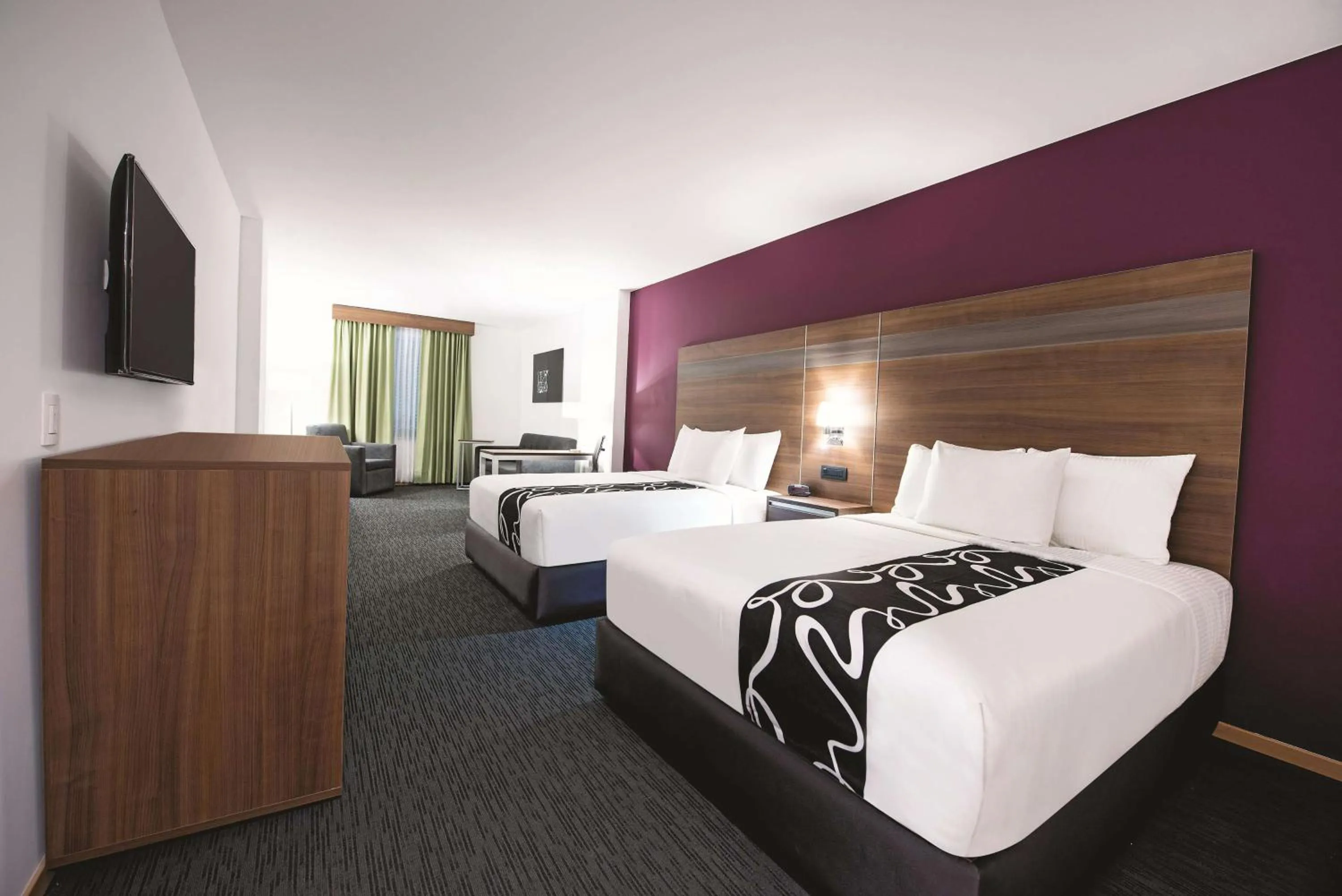 Photo of the whole room, Bed in La Quinta by Wyndham San Jose Chiapa Puebla