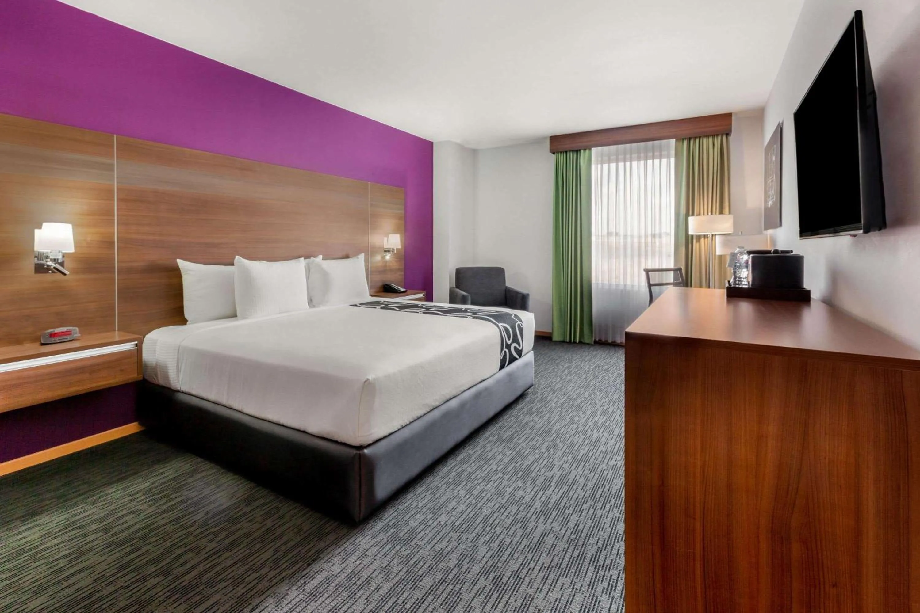 Photo of the whole room, Bed in La Quinta by Wyndham San Jose Chiapa Puebla