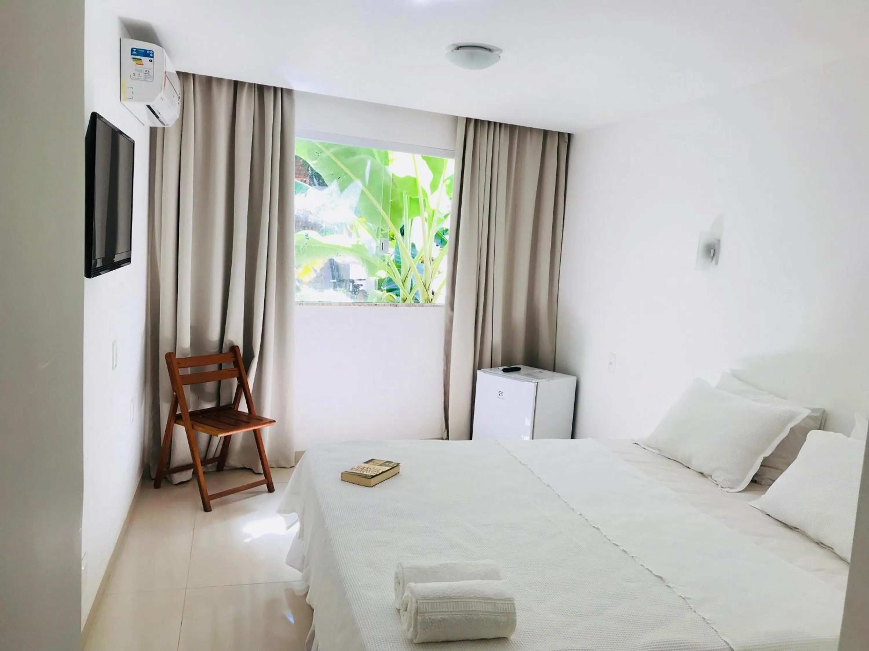 Bed in Vila do Morro Pousada