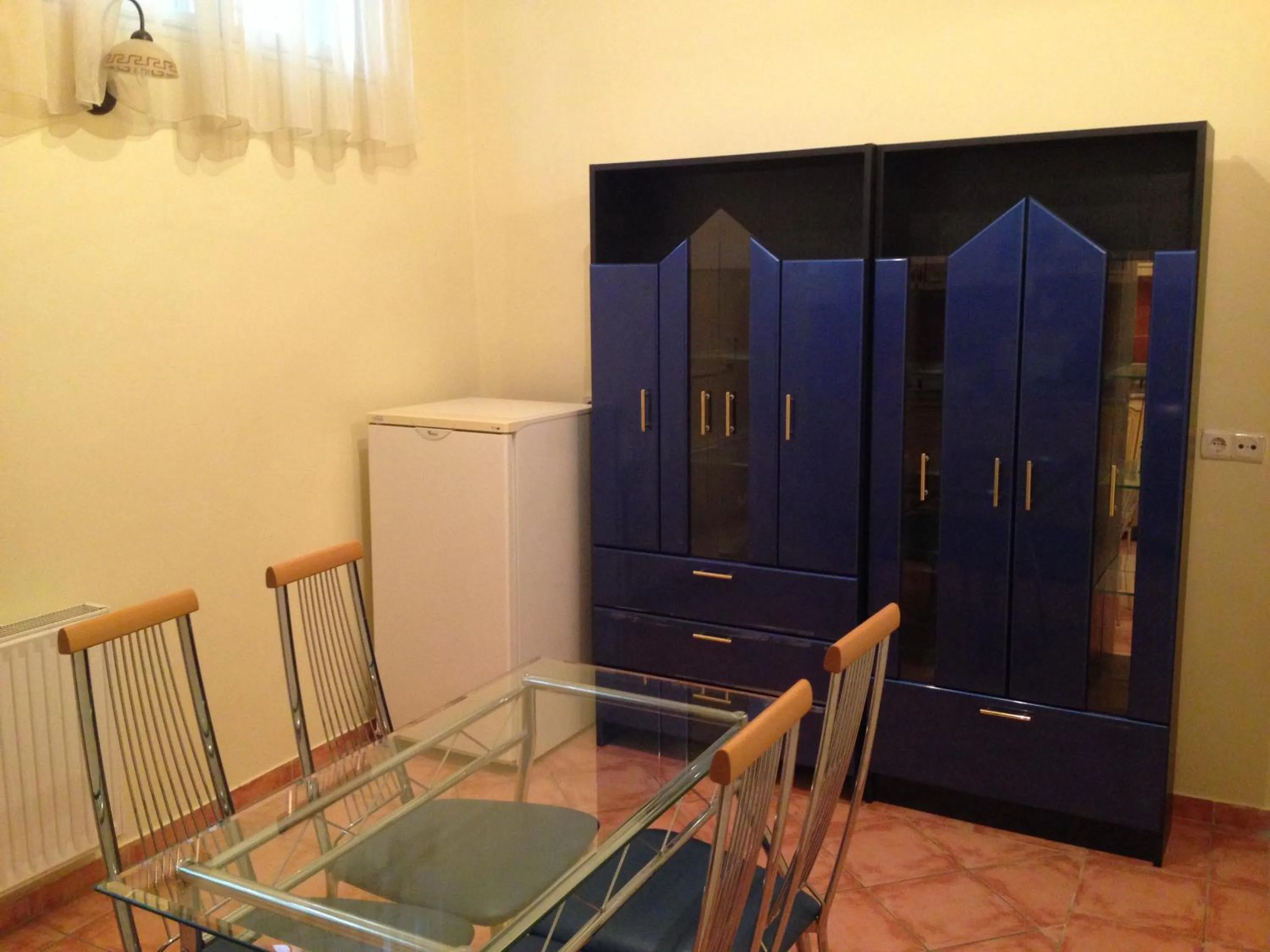 Kitchen or kitchenette in Péterfia Apartman