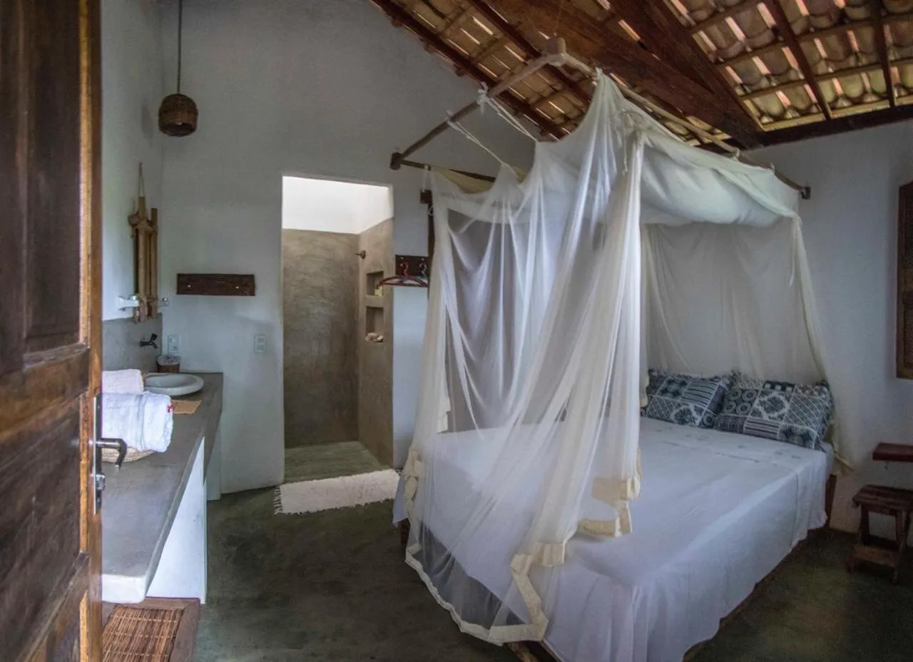 Bed in Pousada Spa Oasis