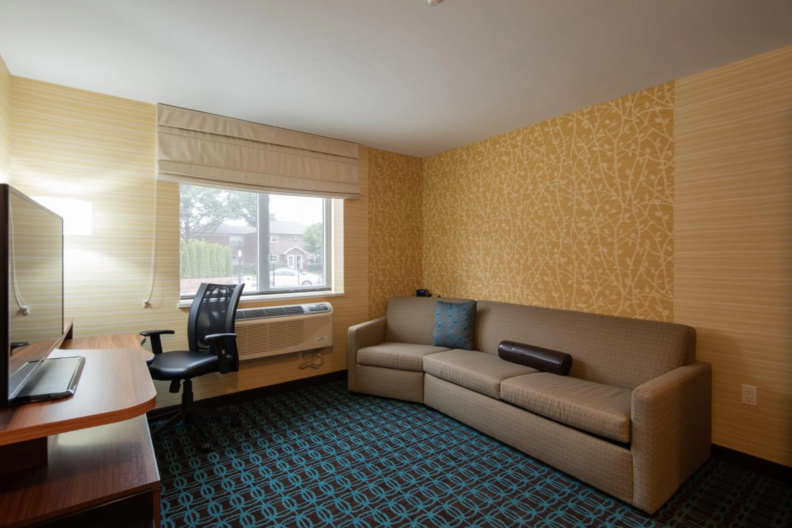 Living room in Fairfield Inn & Suites by Marriott New York Queens/Fresh Meadows