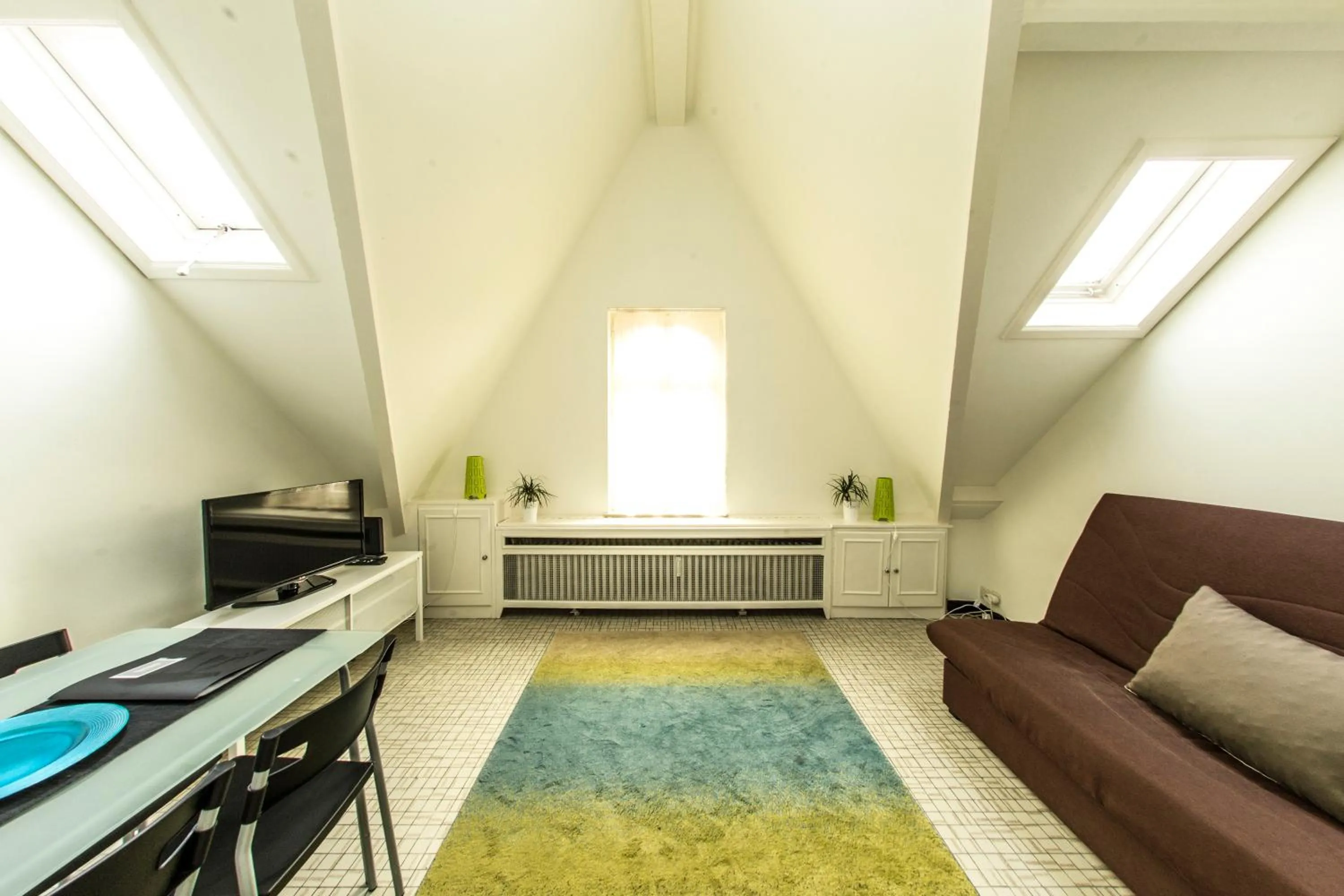 Living room in Rentbynight Aparthotel