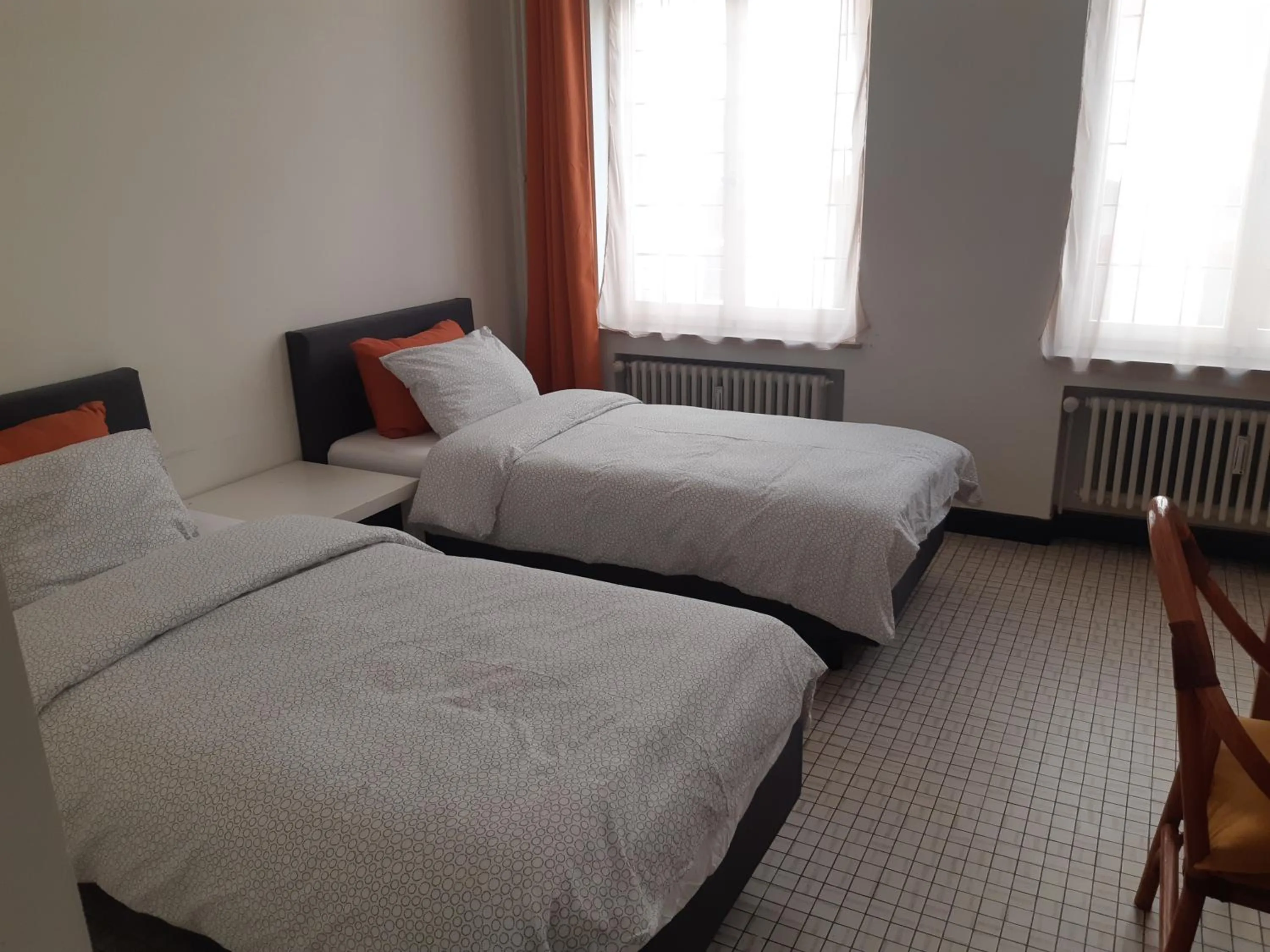 Bed in Rentbynight Aparthotel