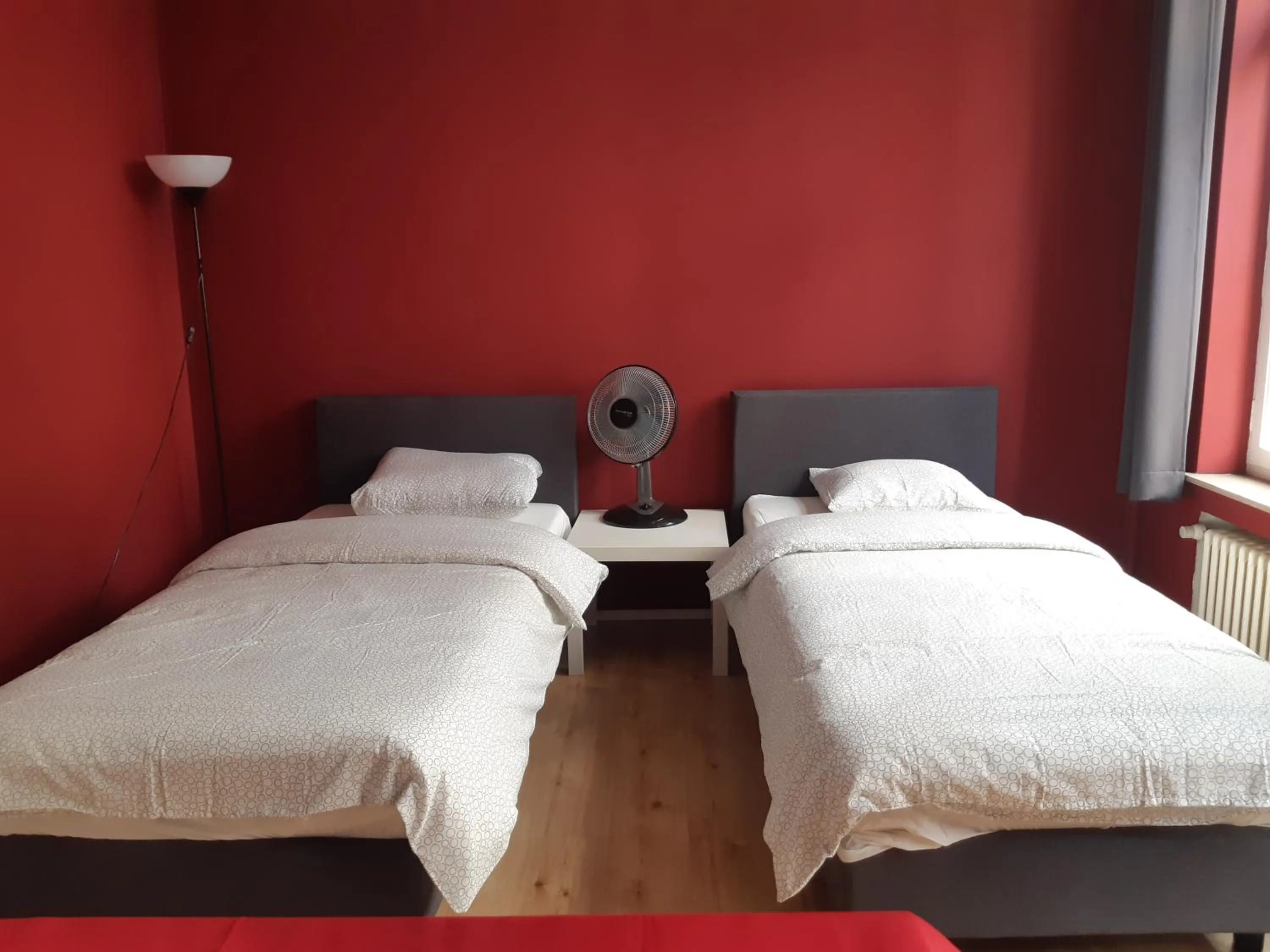 Bed in Rentbynight Aparthotel