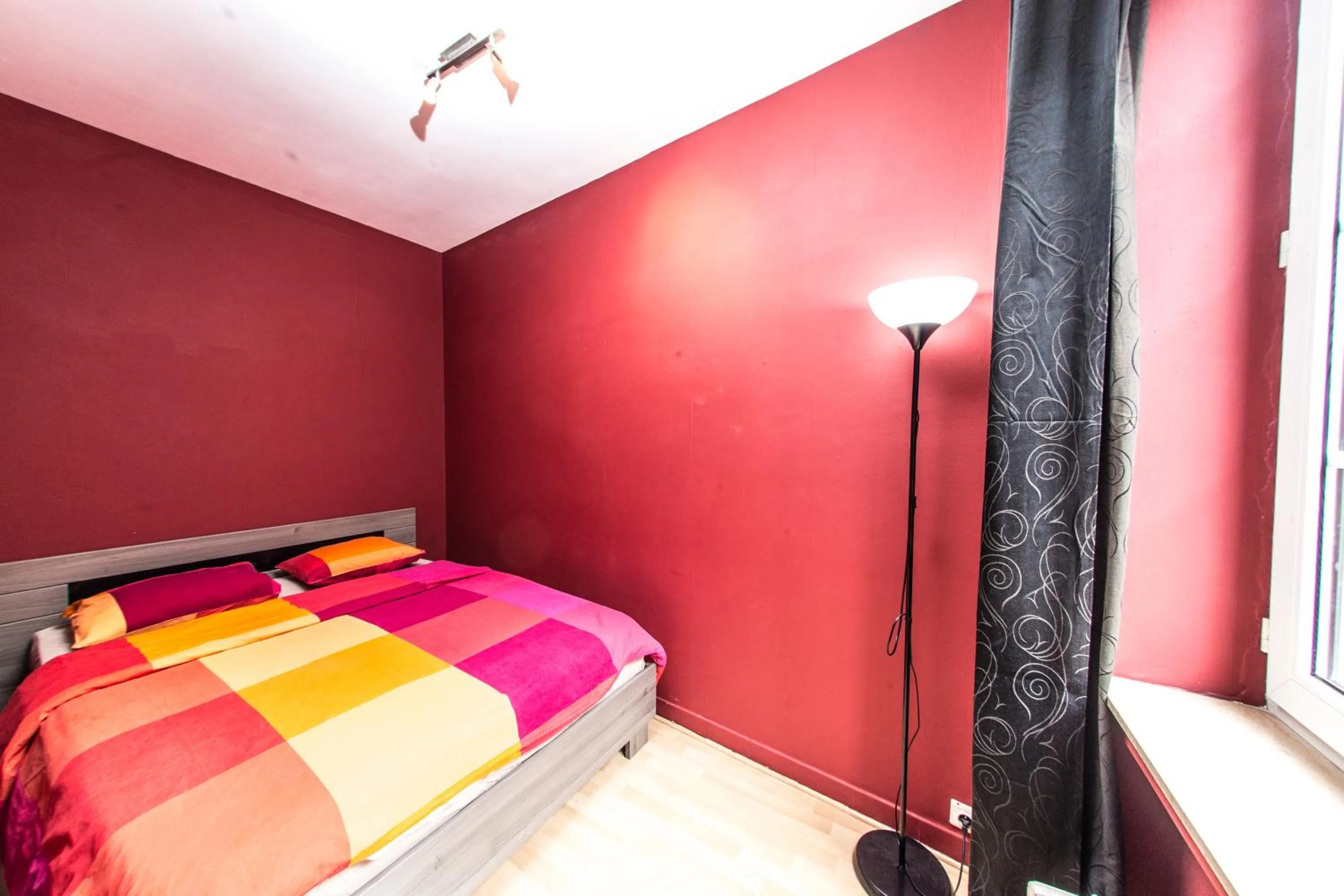 Bedroom in Rentbynight Aparthotel