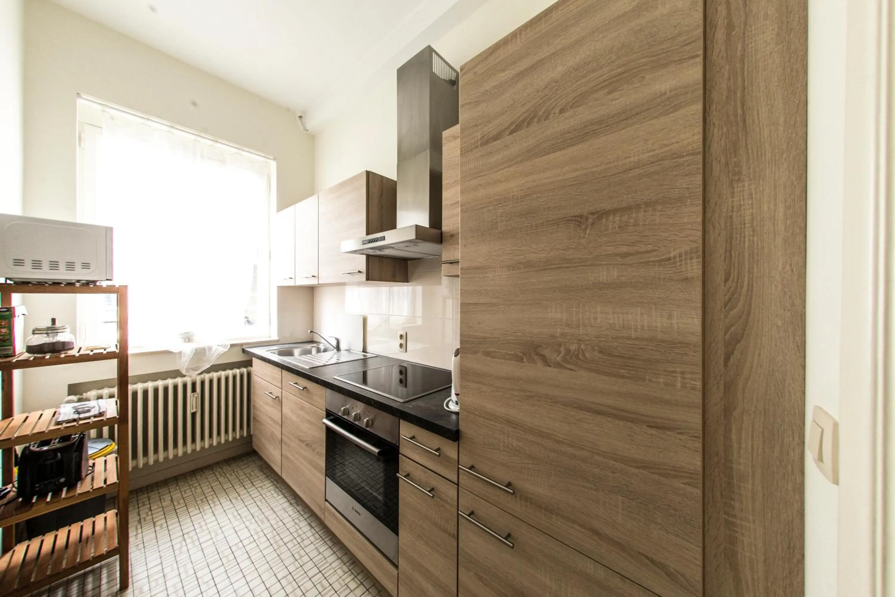 Kitchen or kitchenette in Rentbynight Aparthotel