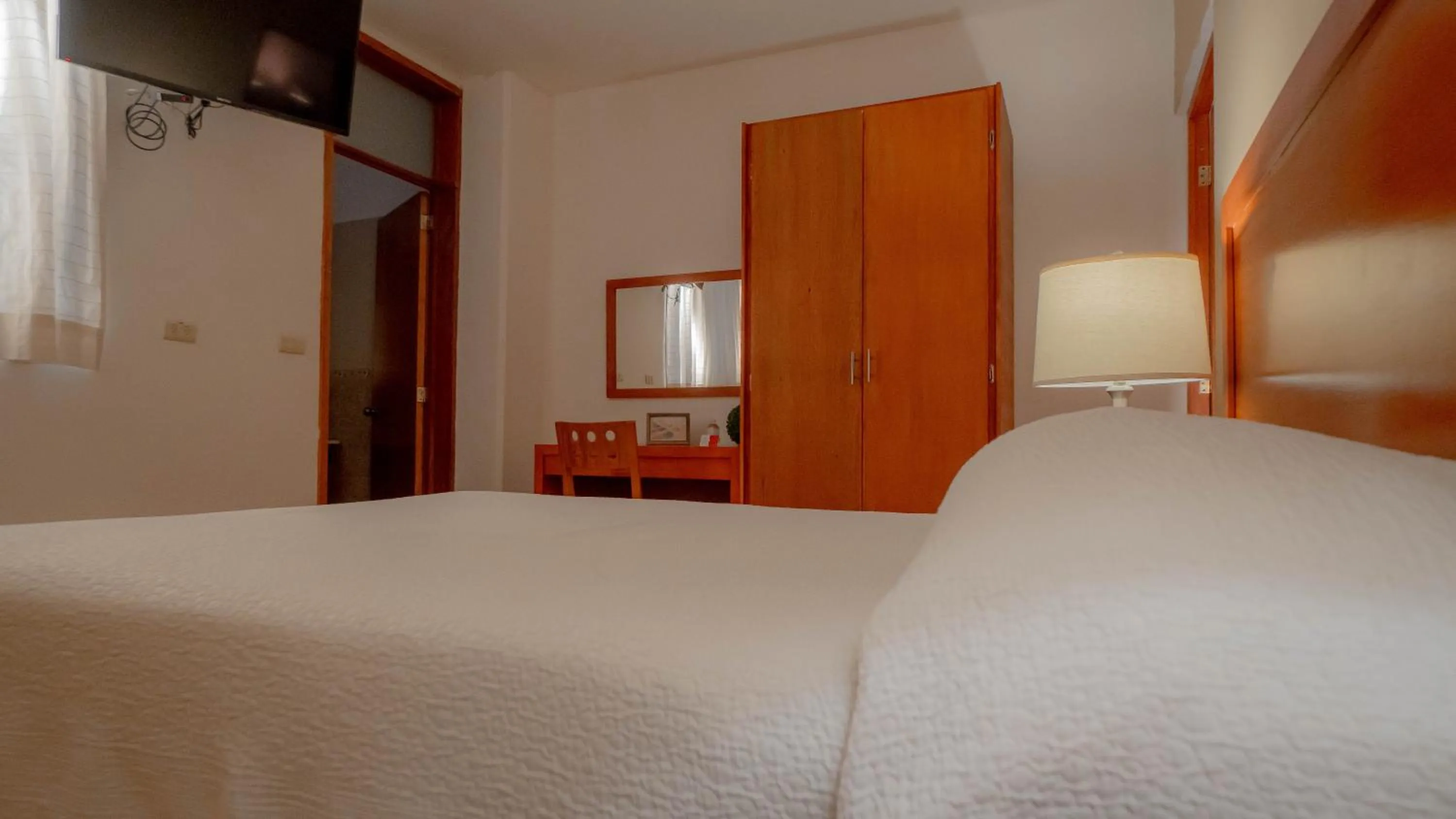 Bed in Hotel Marllou