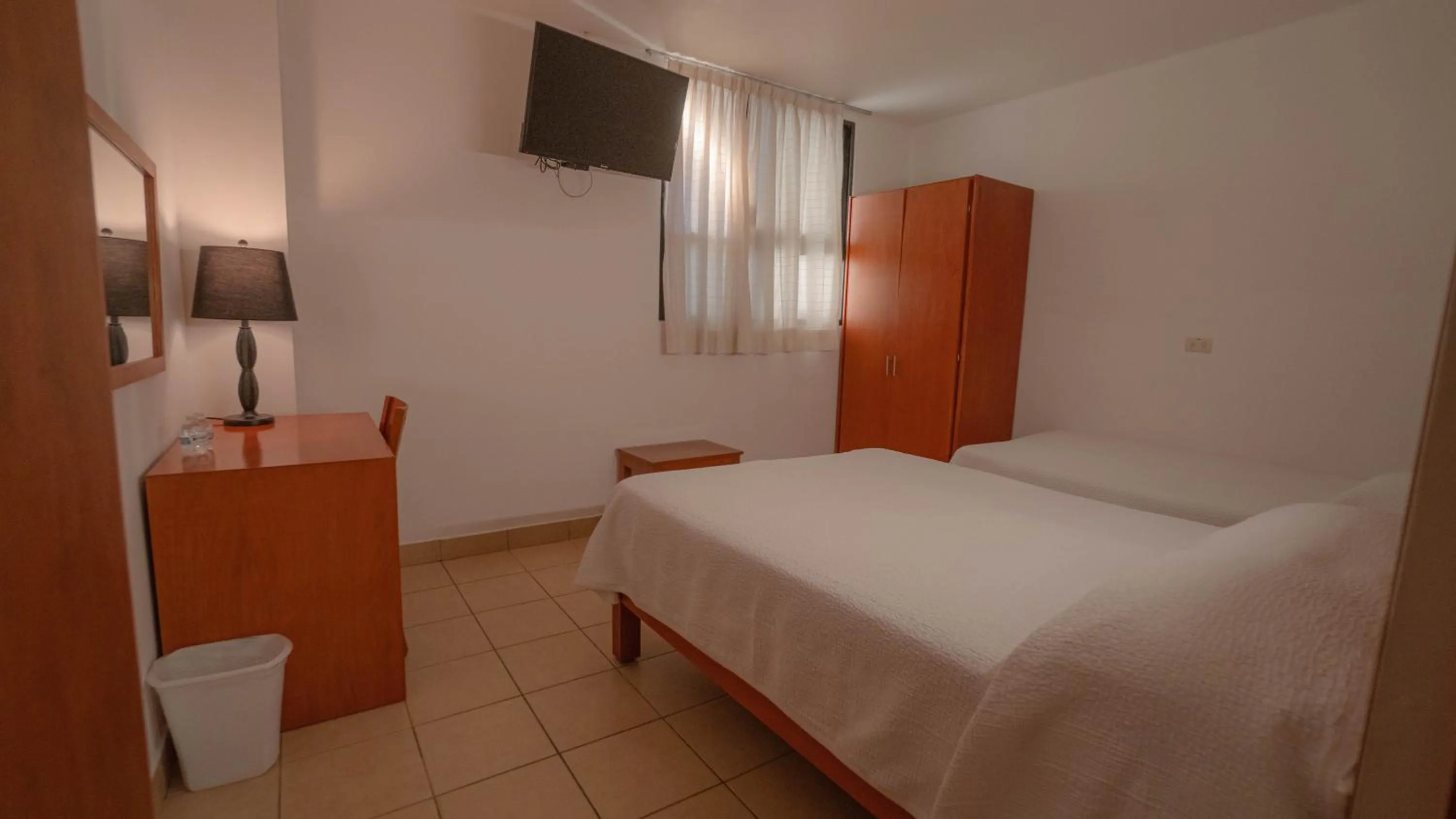 Bed in Hotel Marllou