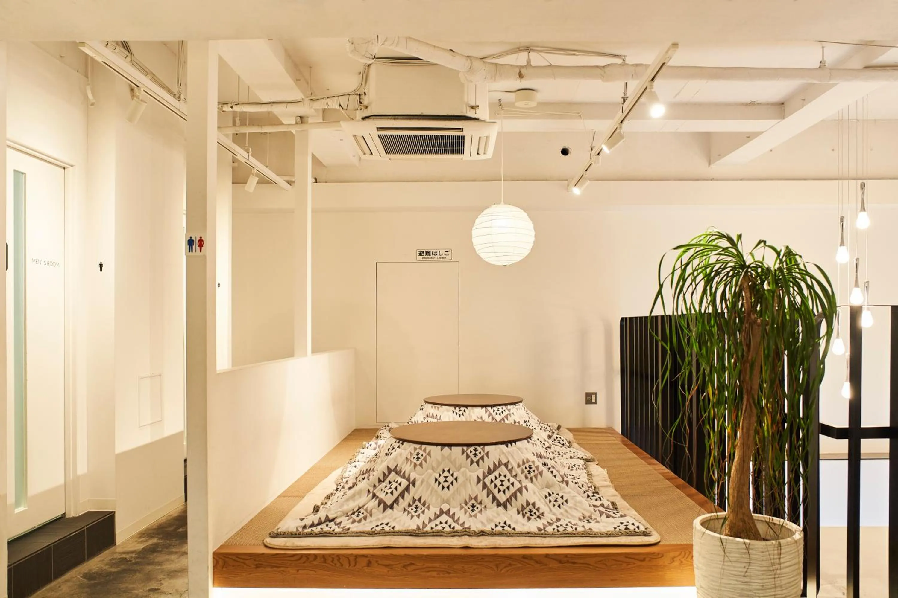 Communal lounge/ TV room, Bed in Coco Stay Nishikawaguchi Ekimae