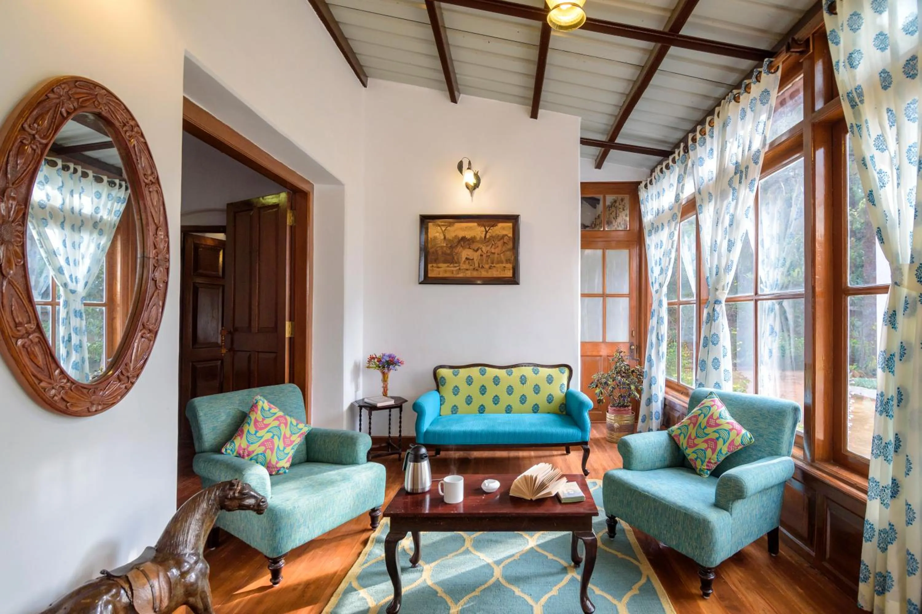 Living room in SaffronStays Milton Abbott Estate - 2BR colonial-era bungalow with garden, golf course views & bonfire nights near Ooty Golf Club