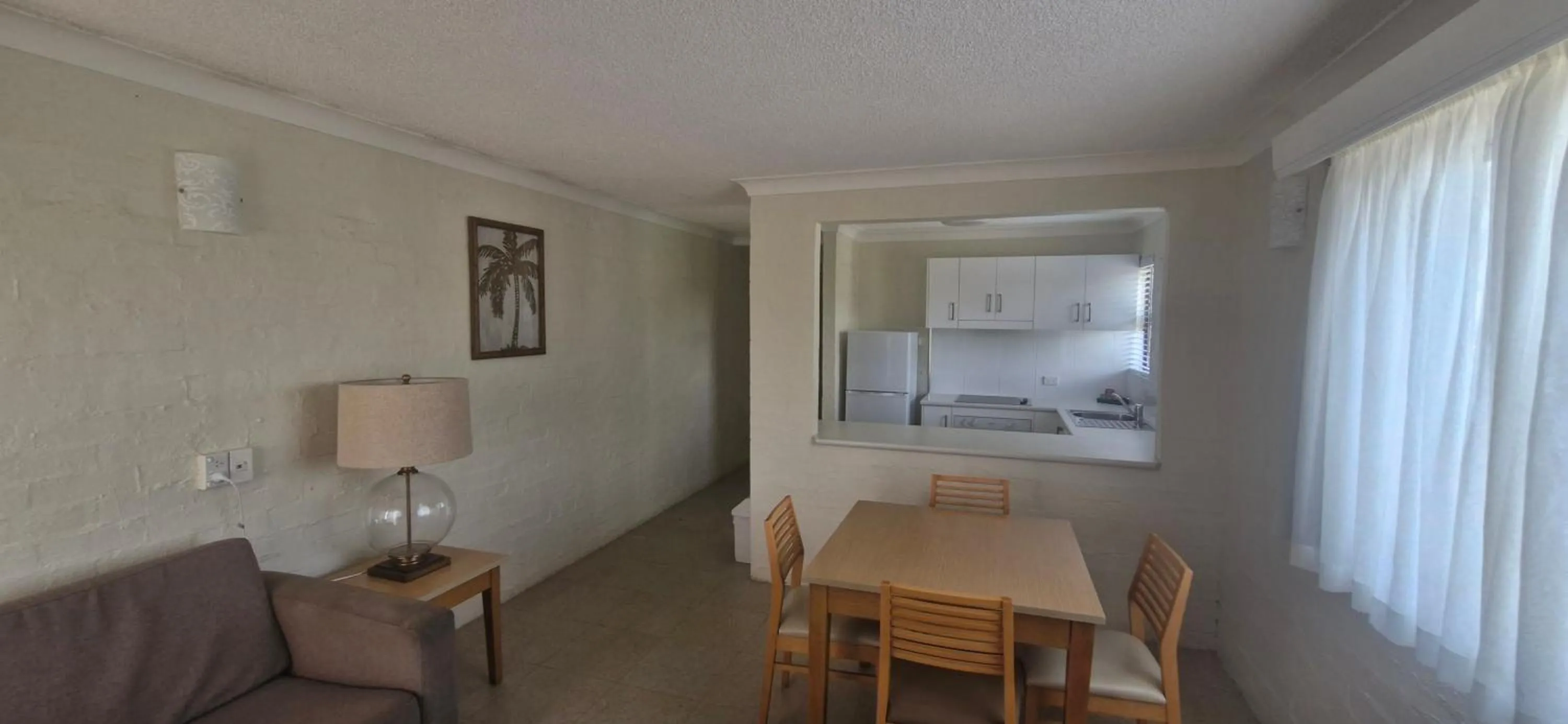 Kitchen or kitchenette, Bed in Don Pancho Beach Resort