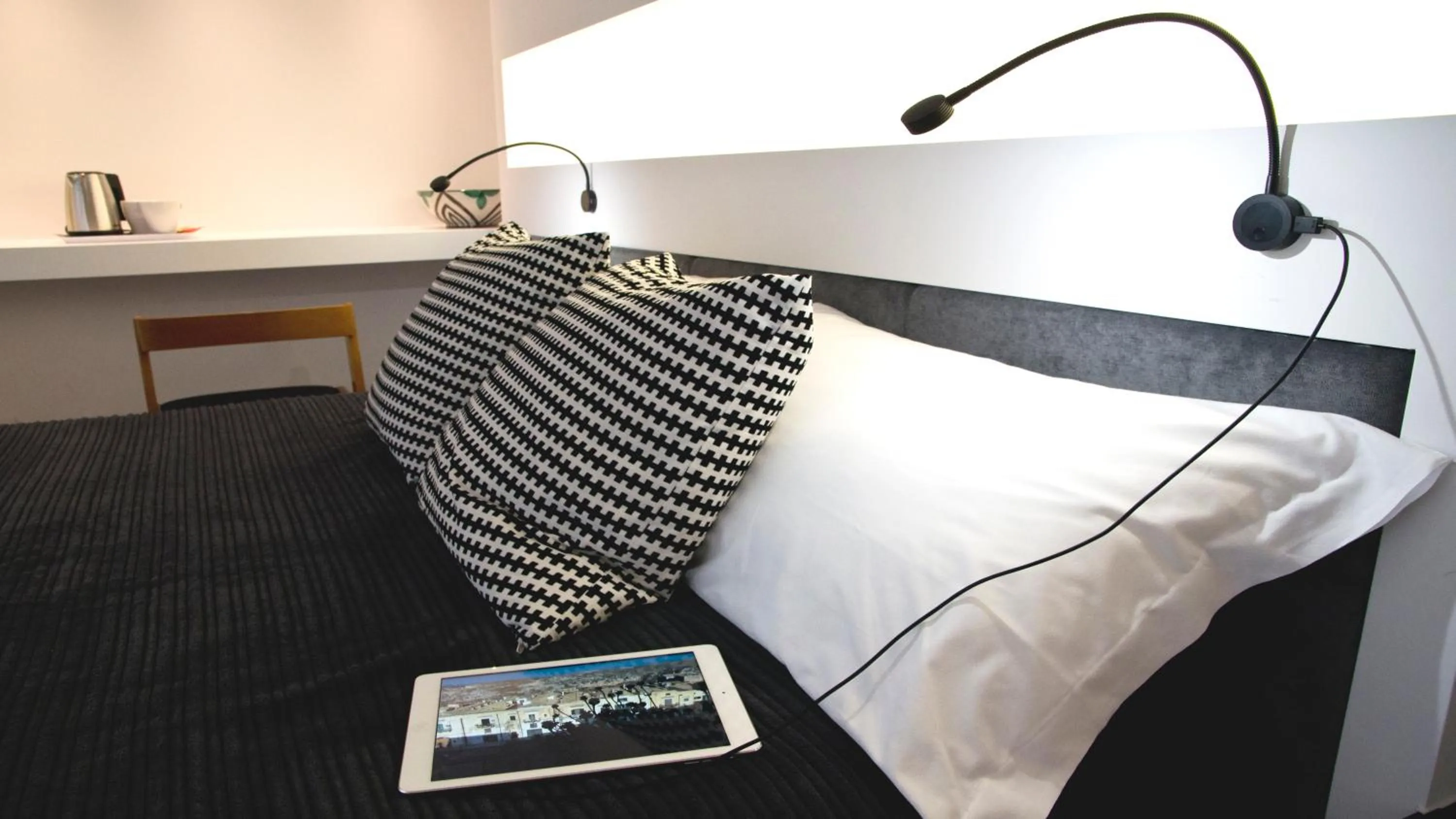 Decorative detail, Bed in Limen Matera Guesthouse